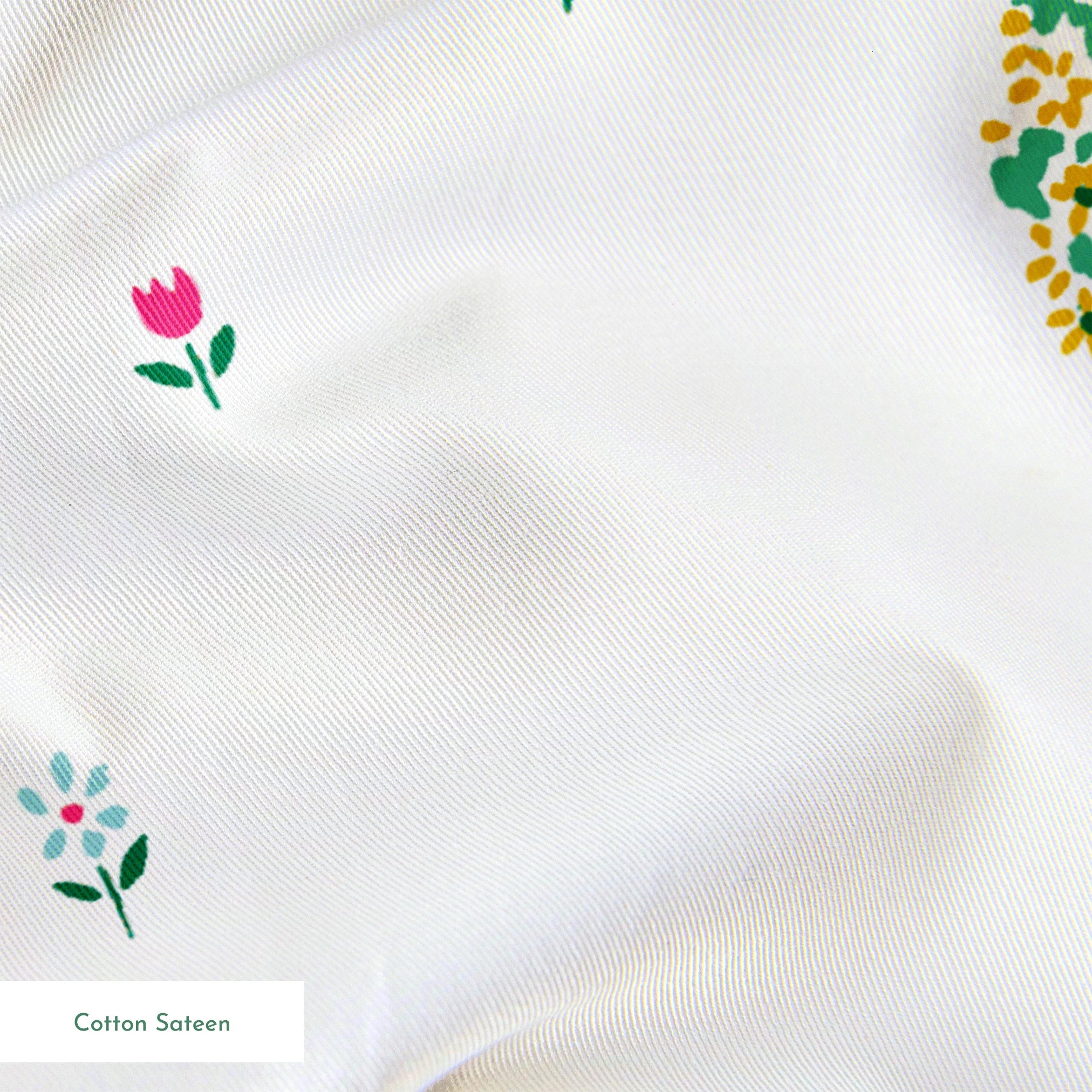 Whimsical pattern of colorful trees on small hills with scattered tiny flowers on a white background springs sateen texture