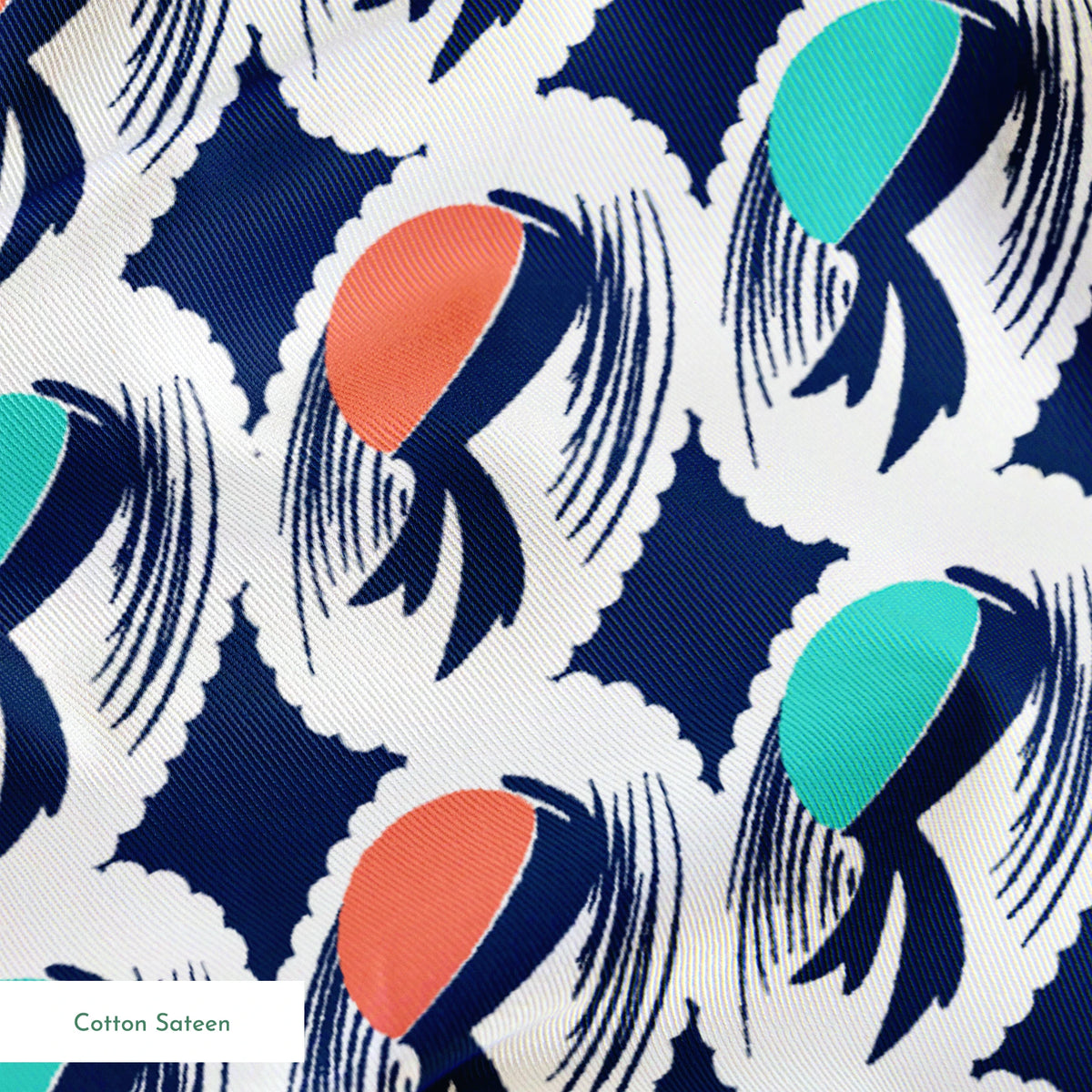 Abstract pattern with repeating mint green and coral circular shapes on navy background with white brushstroke details springs sateen texture