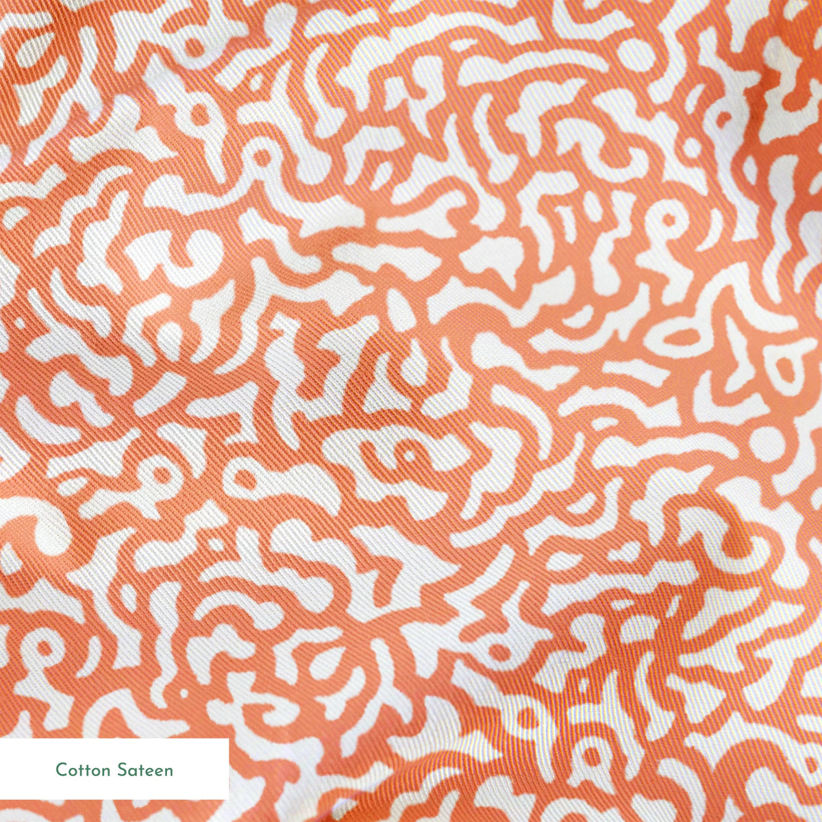 Coral squiggly pattern with organic, maze-like curves on white background springs sateen texture
