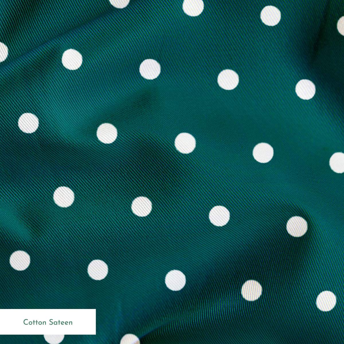 White circles on a dark teal background springs sateen texture