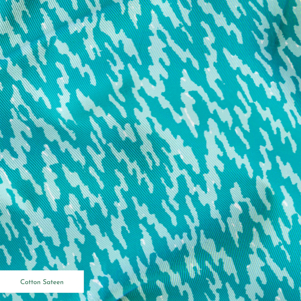 Turquoise and light blue abstract pattern with irregular vertical brush-like streaks springs sateen texture