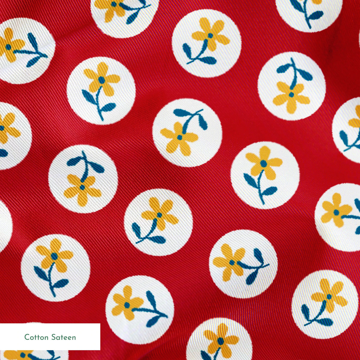 Yellow flowers with blue stems on white circles against red background in repeating pattern springs sateen texture