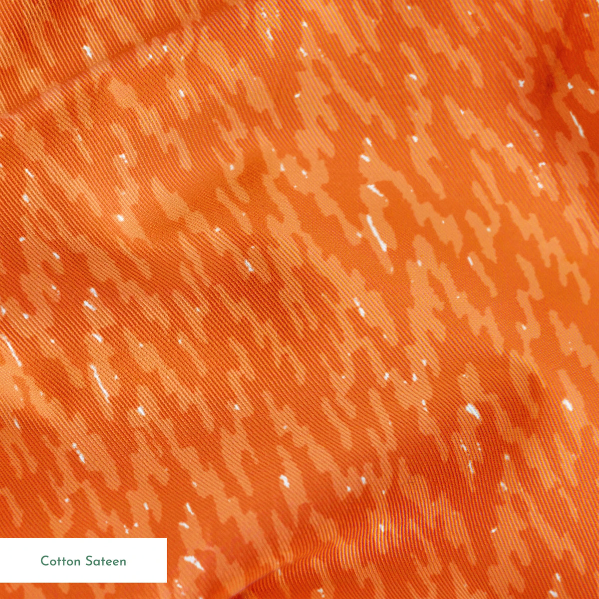 Orange textured background with vertical brushstroke pattern in varying shades of terracotta springs sateen texture