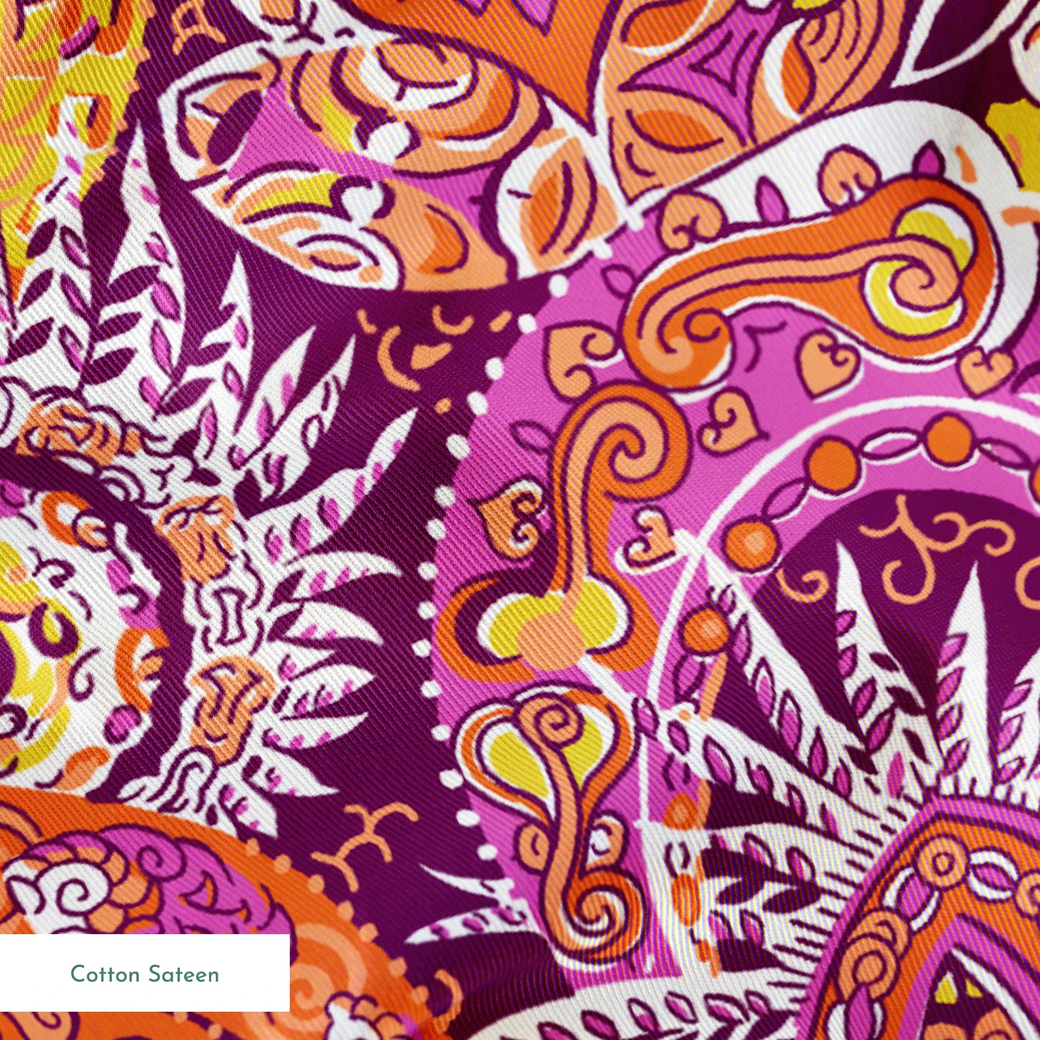 Vibrant paisley pattern with swirling shapes in purple, orange, pink, and yellow tones springs sateen texture