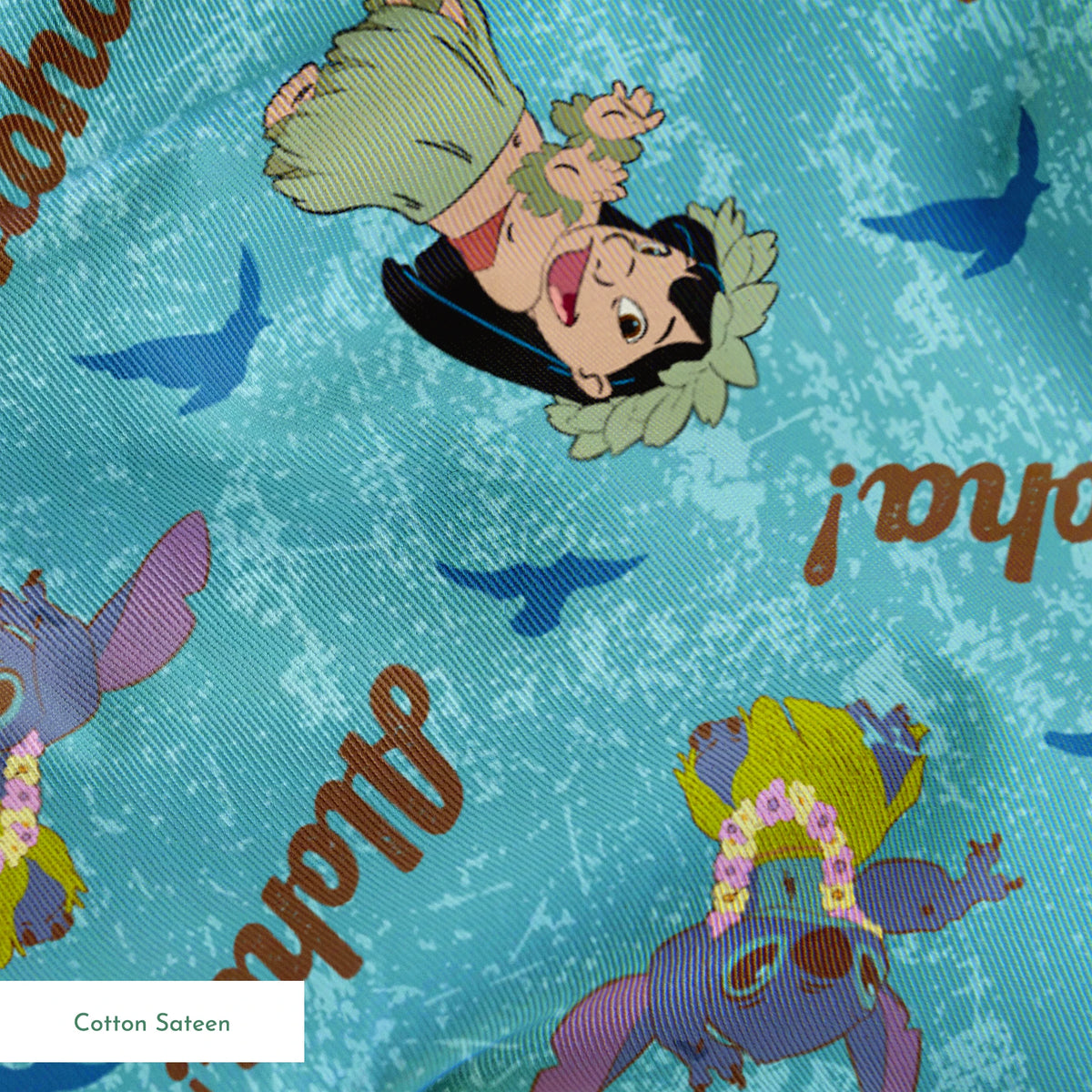 Lilo and Stitch pattern on turquoise background with "Aloha!" text and blue silhouettes springs sateen texture