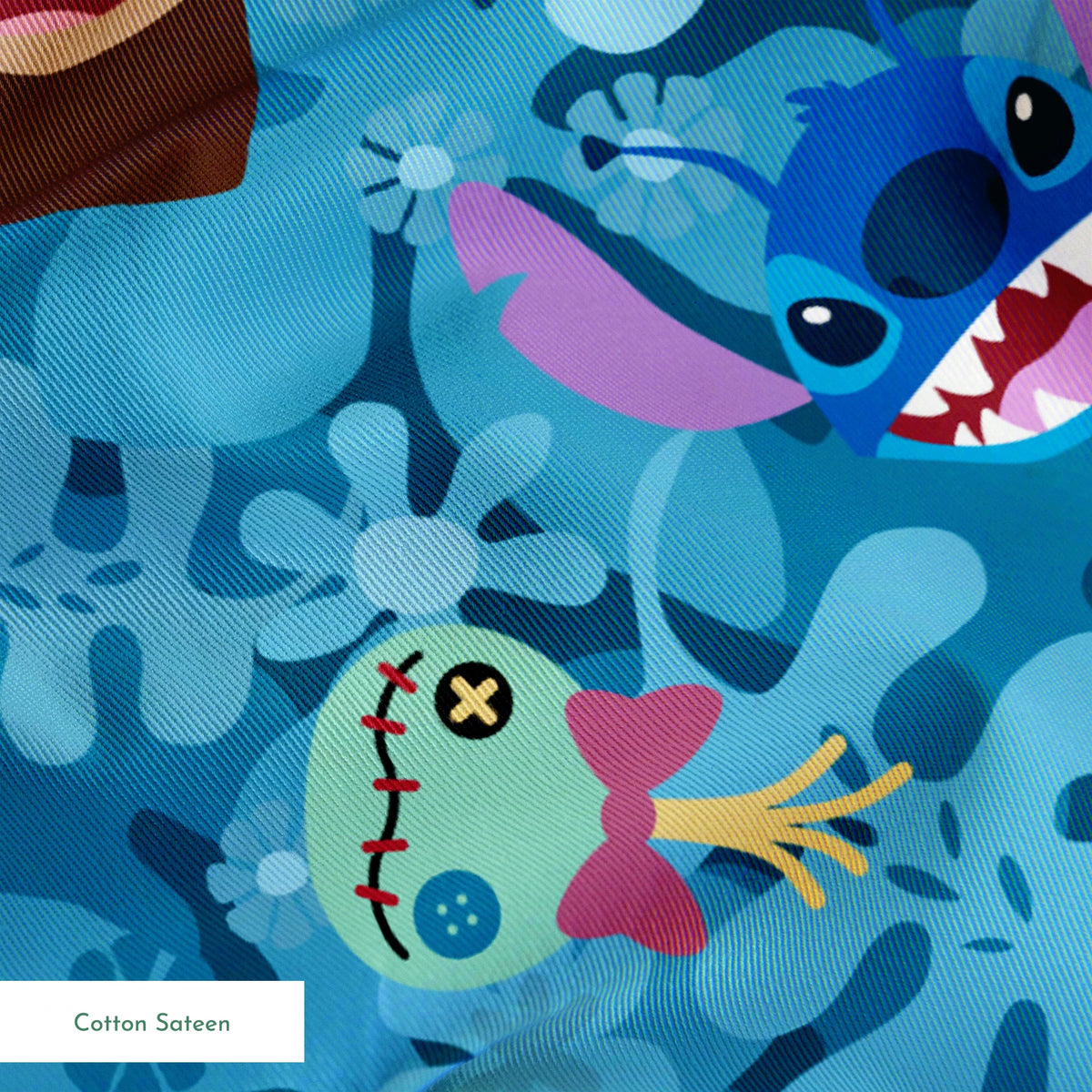 Disney's Stitch among floral elements and smiling faces on turquoise background springs sateen texture
