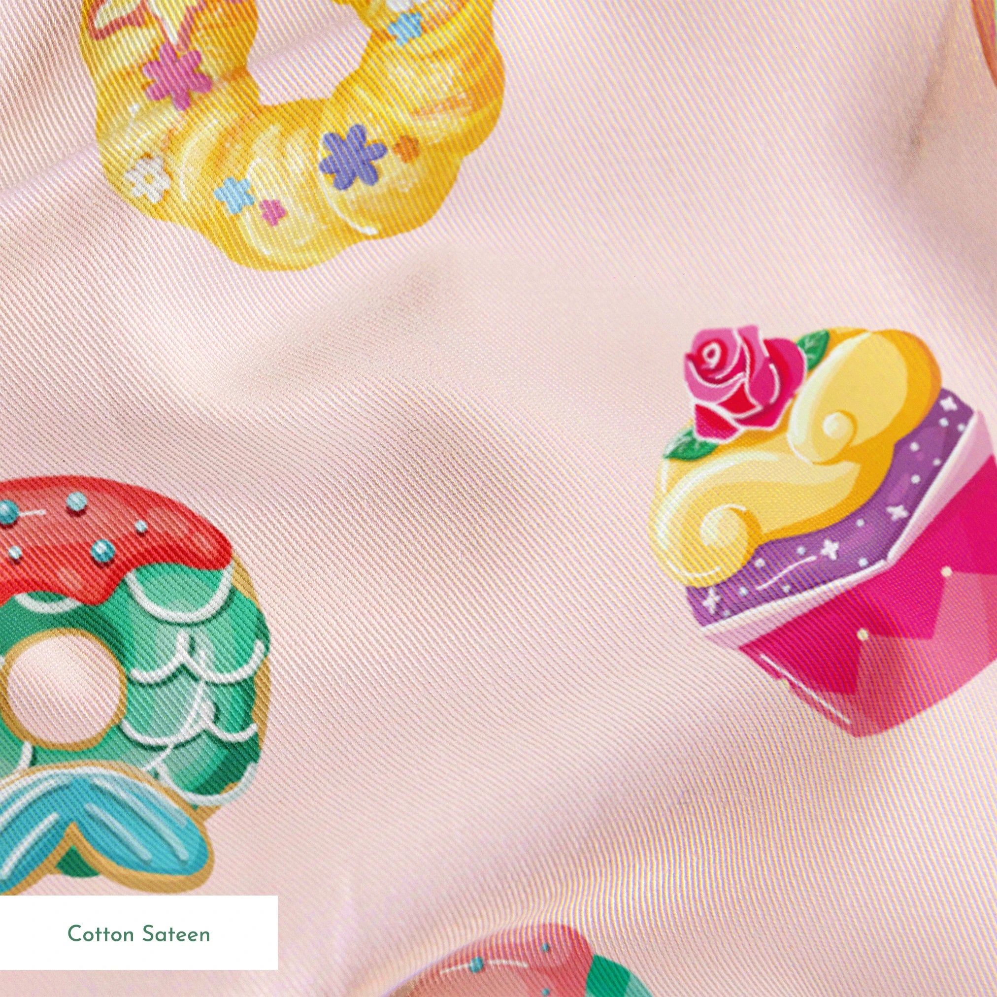 DIsney Princess-inspired dessert pattern with donuts, cupcakes, and macarons on a light pink background springs sateen texture