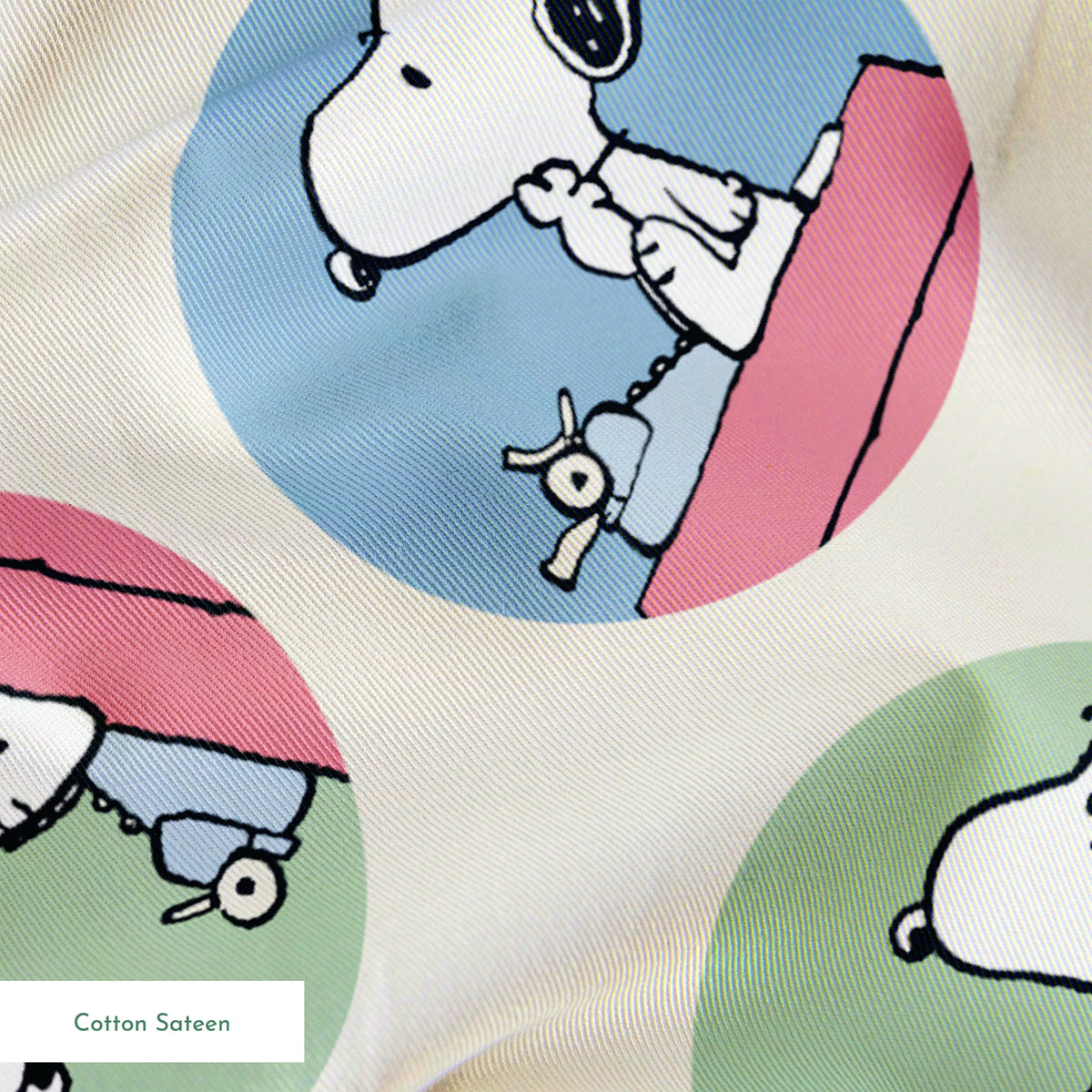Cartoon Snoopy pattern with the beagle character in circular frames of blue, green, and purple backgrounds springs sateen texture