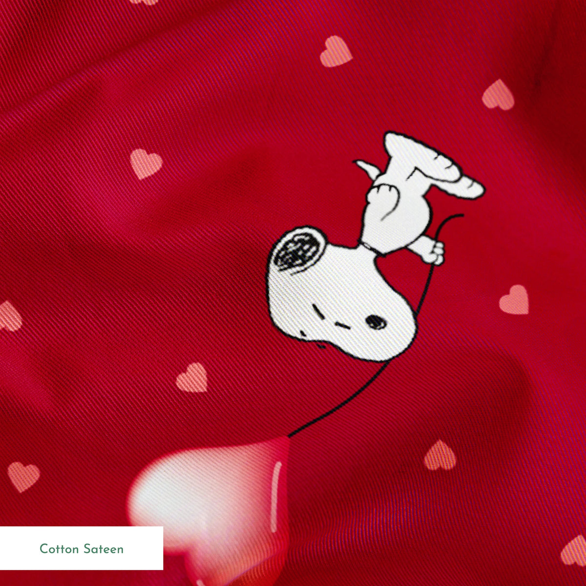 Snoopy scattered on red background with pink and white hearts pattern springs sateen texture