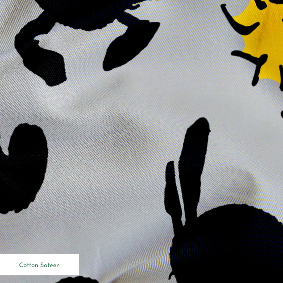 Pattern of Snoopy and Woodstock on gray background with black silhouettes springs sateen texture