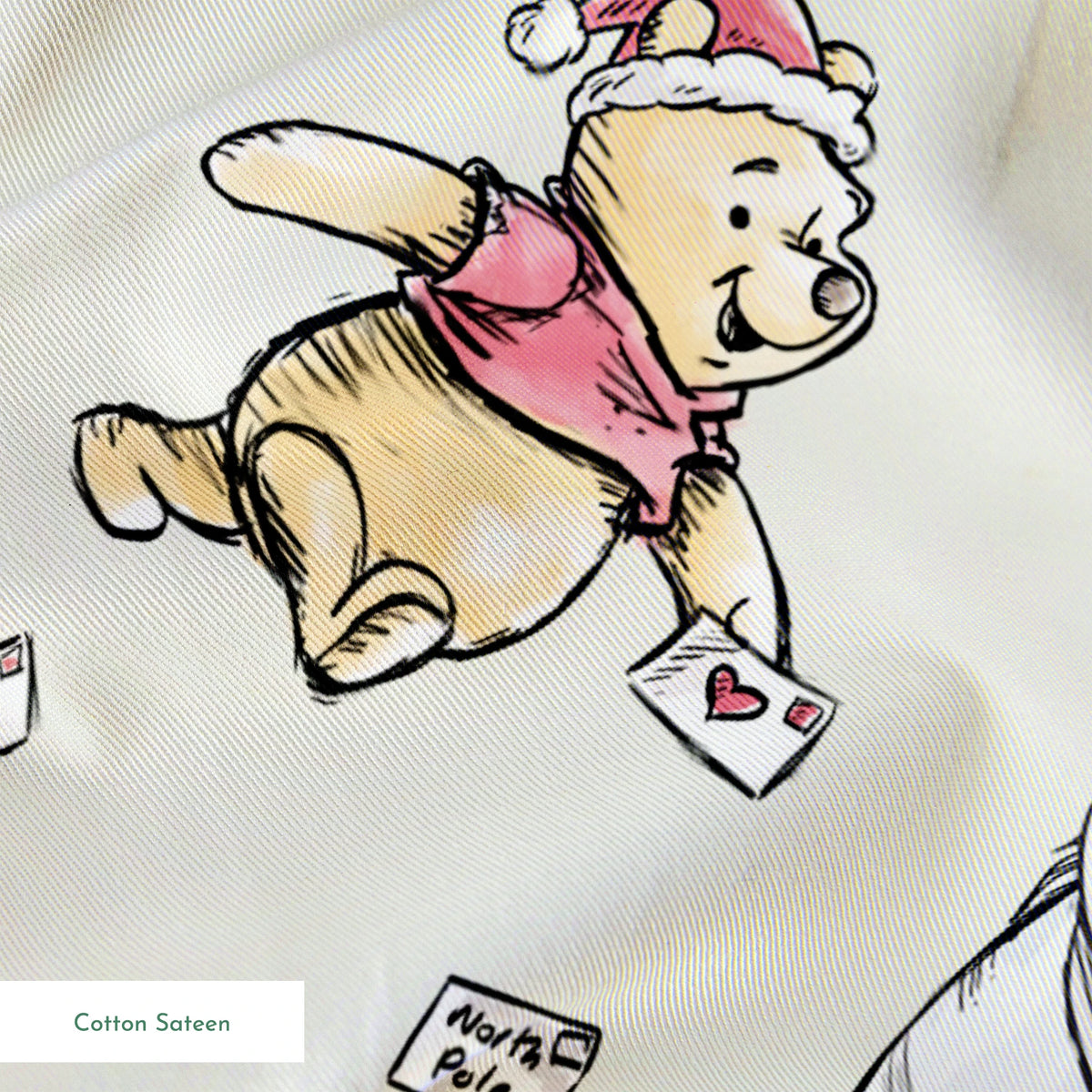 Whimsical cartoon characters in Santa hats on cream background with scattered letters springs sateen texture