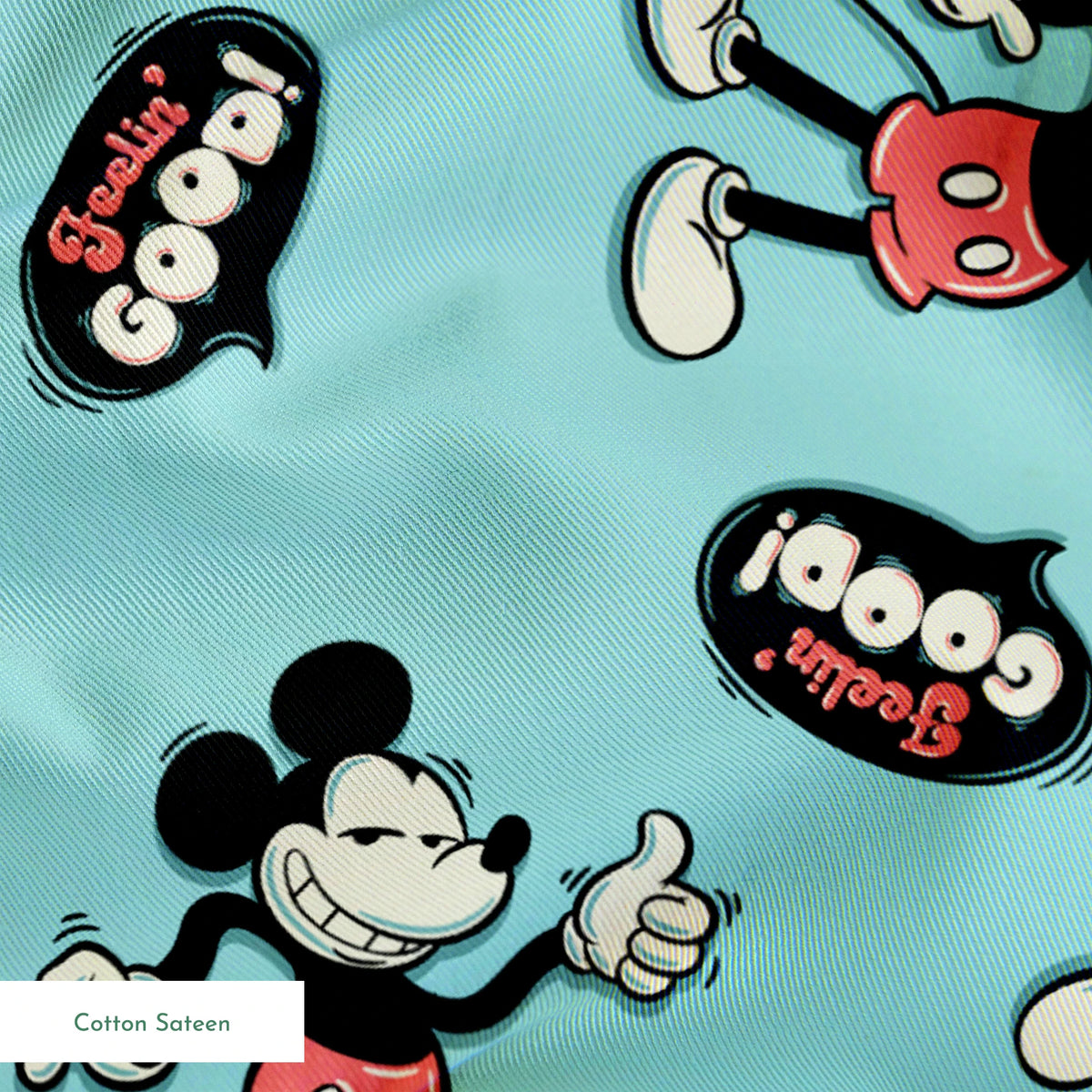 Mickey Mouse pattern on teal background with cartoon characters and "Gosh!" speech bubbles springs sateen texture