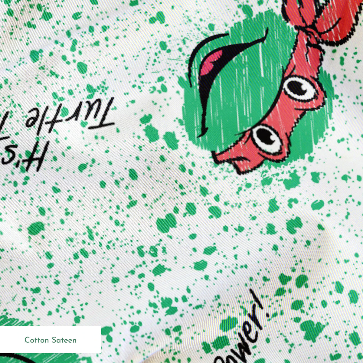 Pattern of Teenage Mutant Ninja Turtles with colorful masks on speckled green background with phrases like "Turtle Power! springs sateen texture