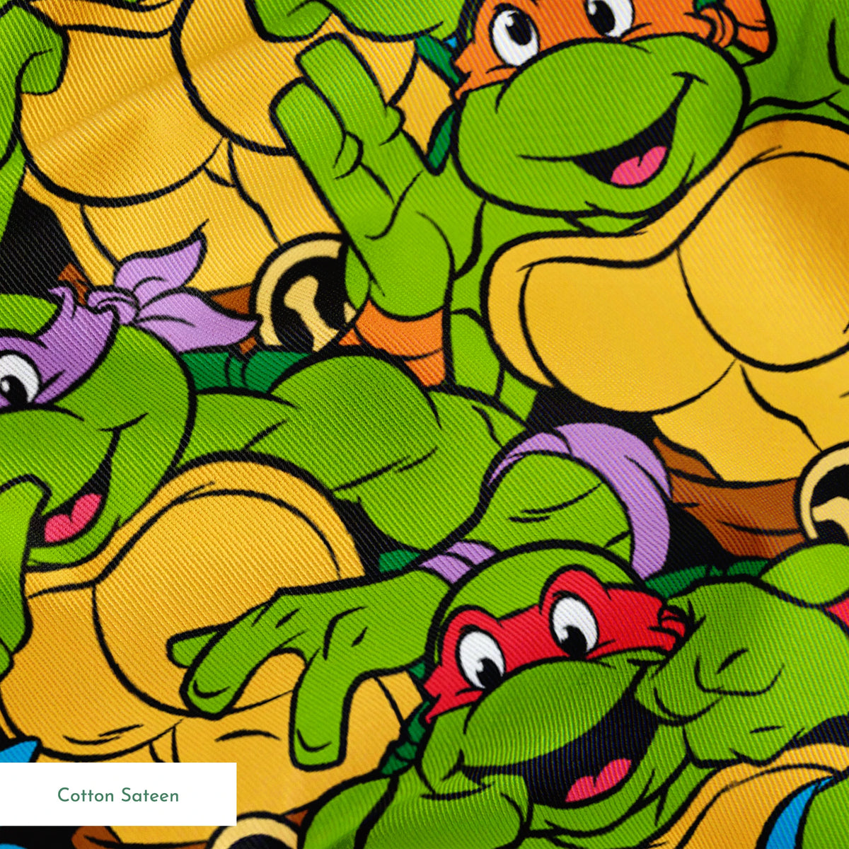 Colorful pattern of cartoon Teenage Mutant Ninja Turtles with green skin and yellow shells springs sateen texture