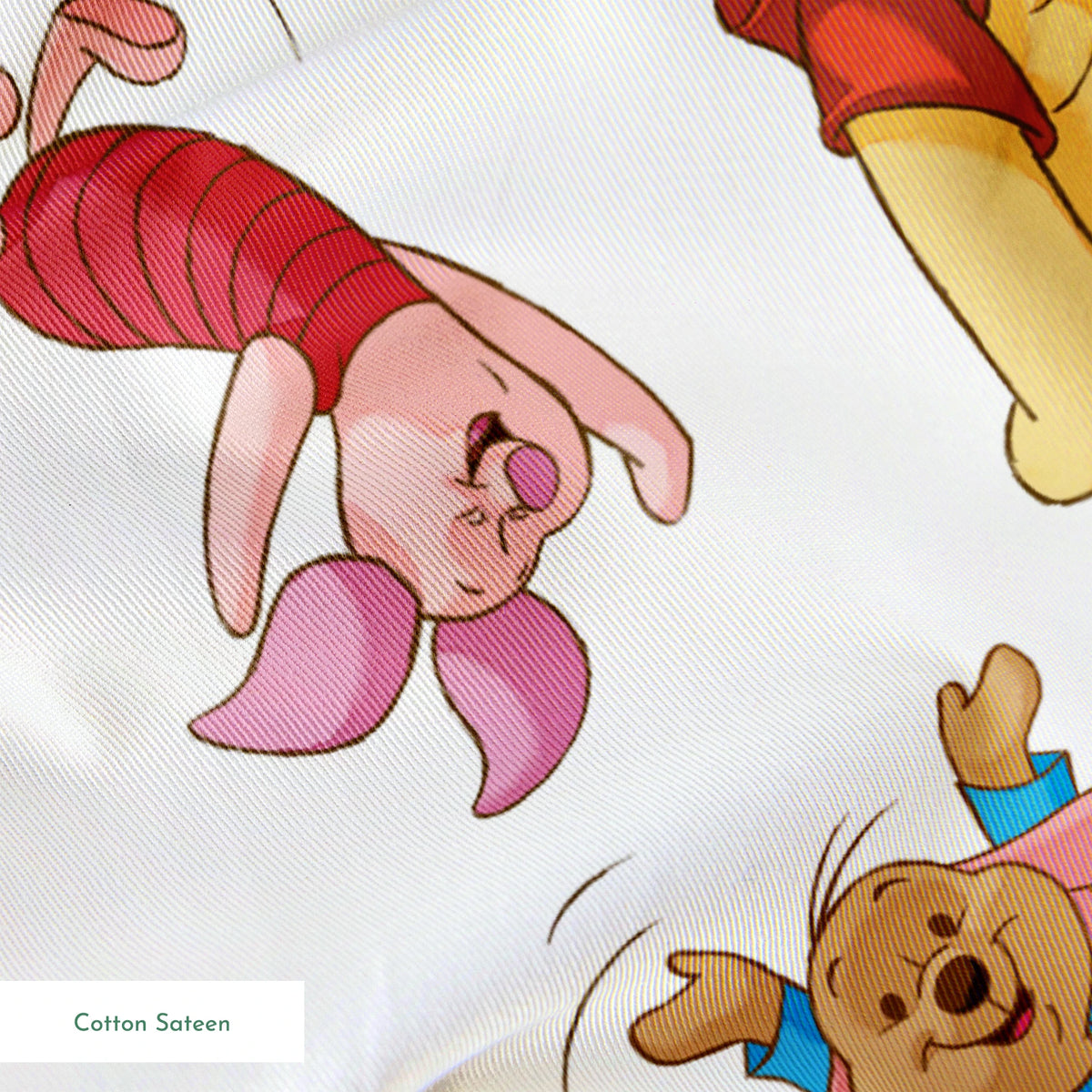 Colorful pattern featuring Winnie the Pooh characters jumping and bouncing on white background springs sateen texture