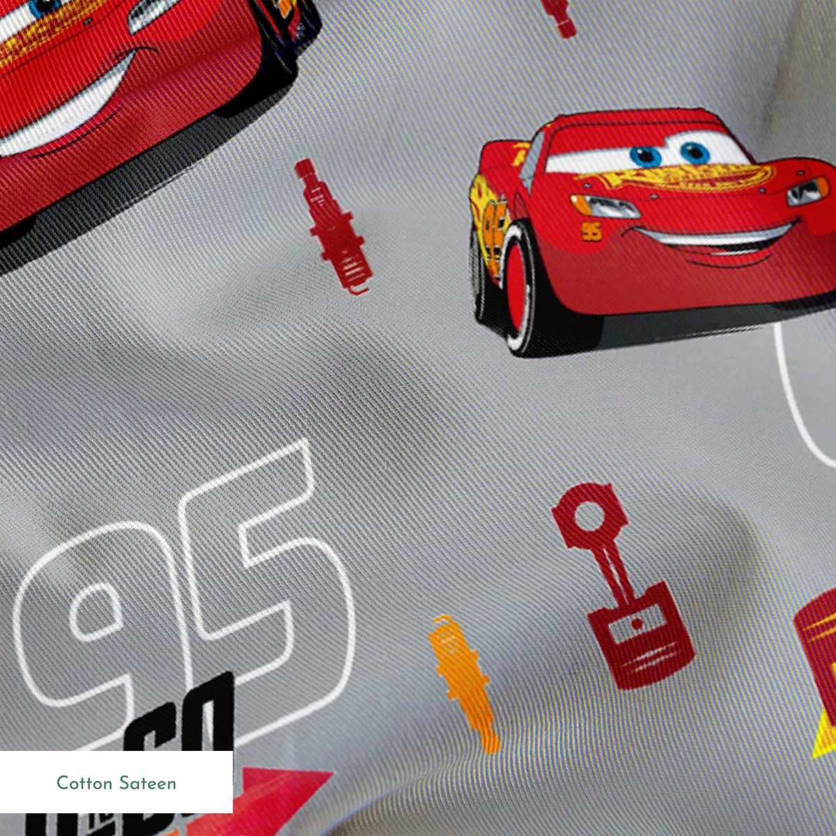 Red race cars with number 95 on gray background with racing graphics and "750 horsepower" text springs sateen texture