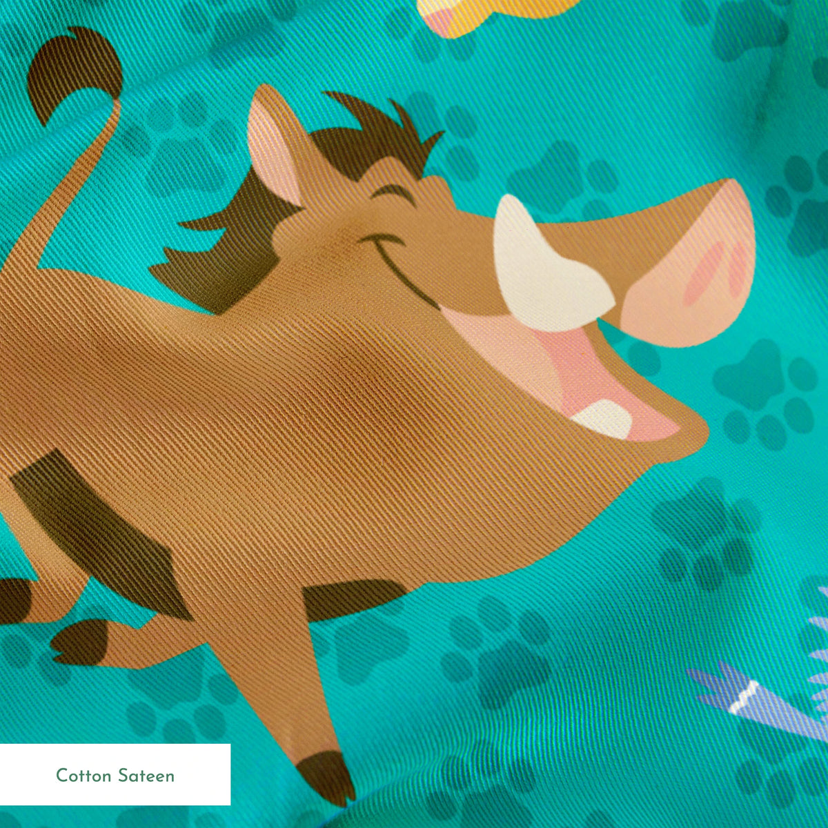 Cartoon Lion King characters pattern with Simba, Pumbaa and others on turquoise paw print background springs sateen texture