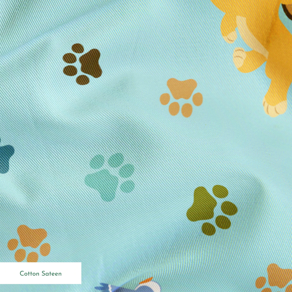 The Lion King pattern with paw prints on light blue background springs sateen texture