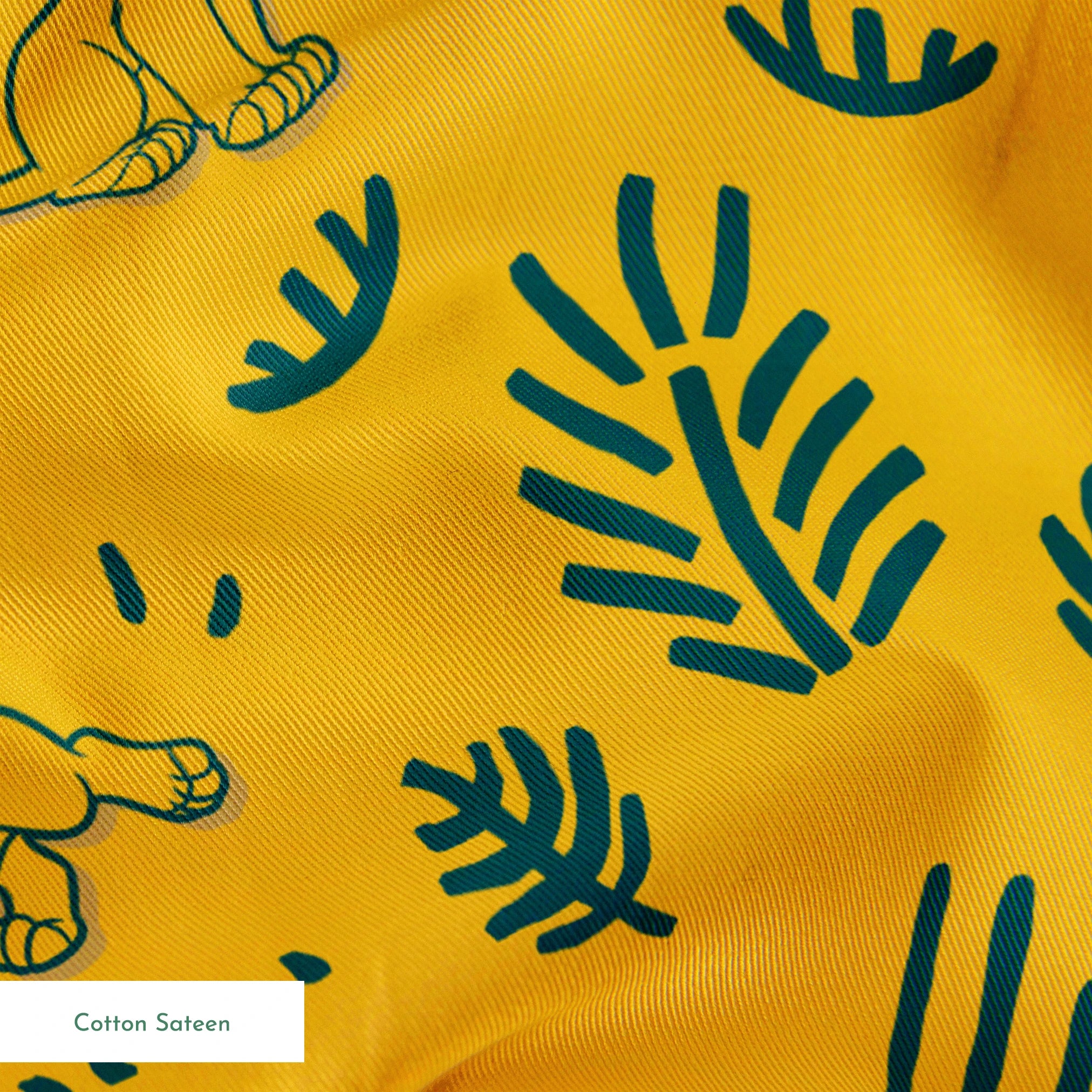 Pattern of cartoon lion cubs with green leaves and decorative elements on bright yellow background springs sateen texture