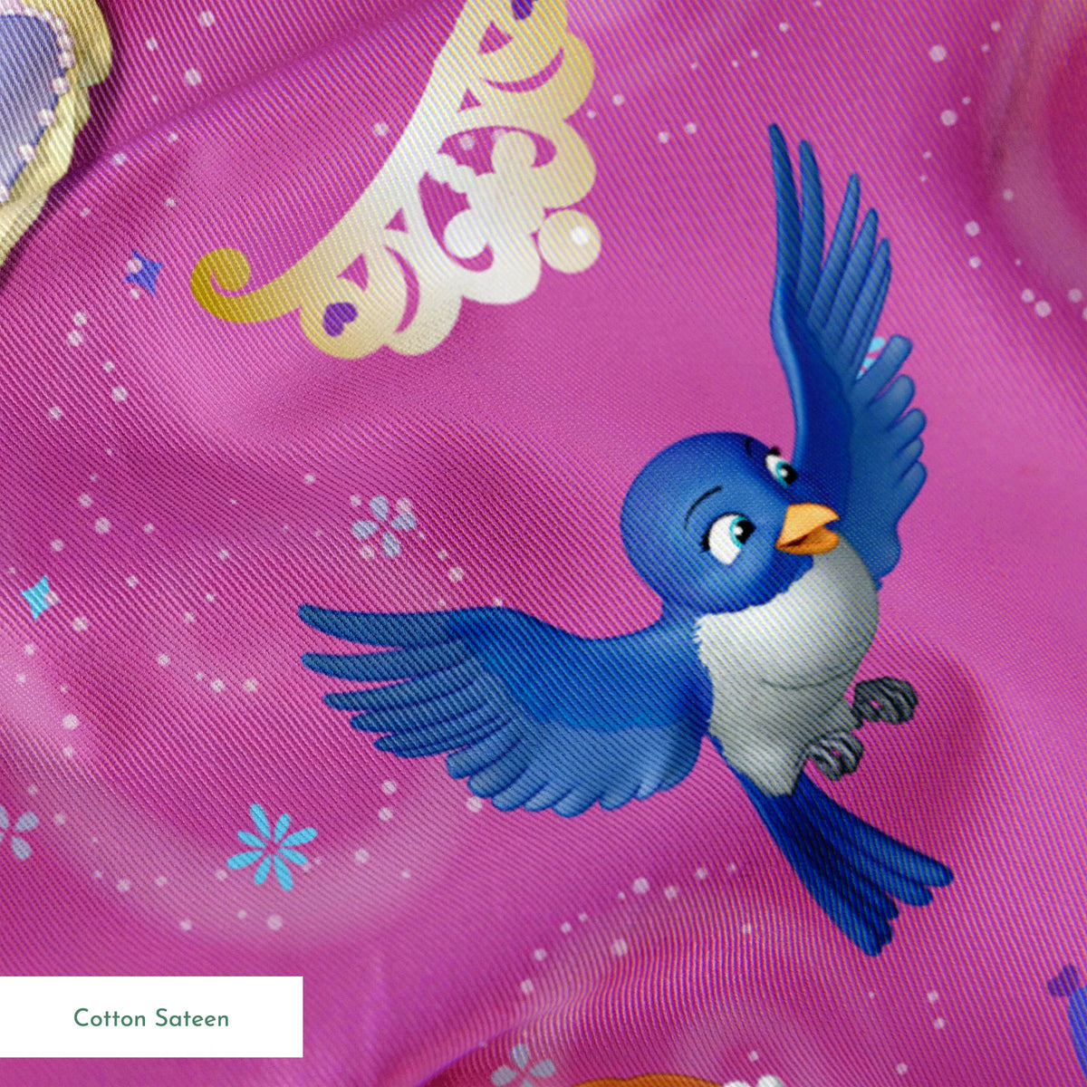 Princess Sofia pattern with purple background, crowns, castles, rabbits, and blue birds scattered among swirling designs springs sateen texture