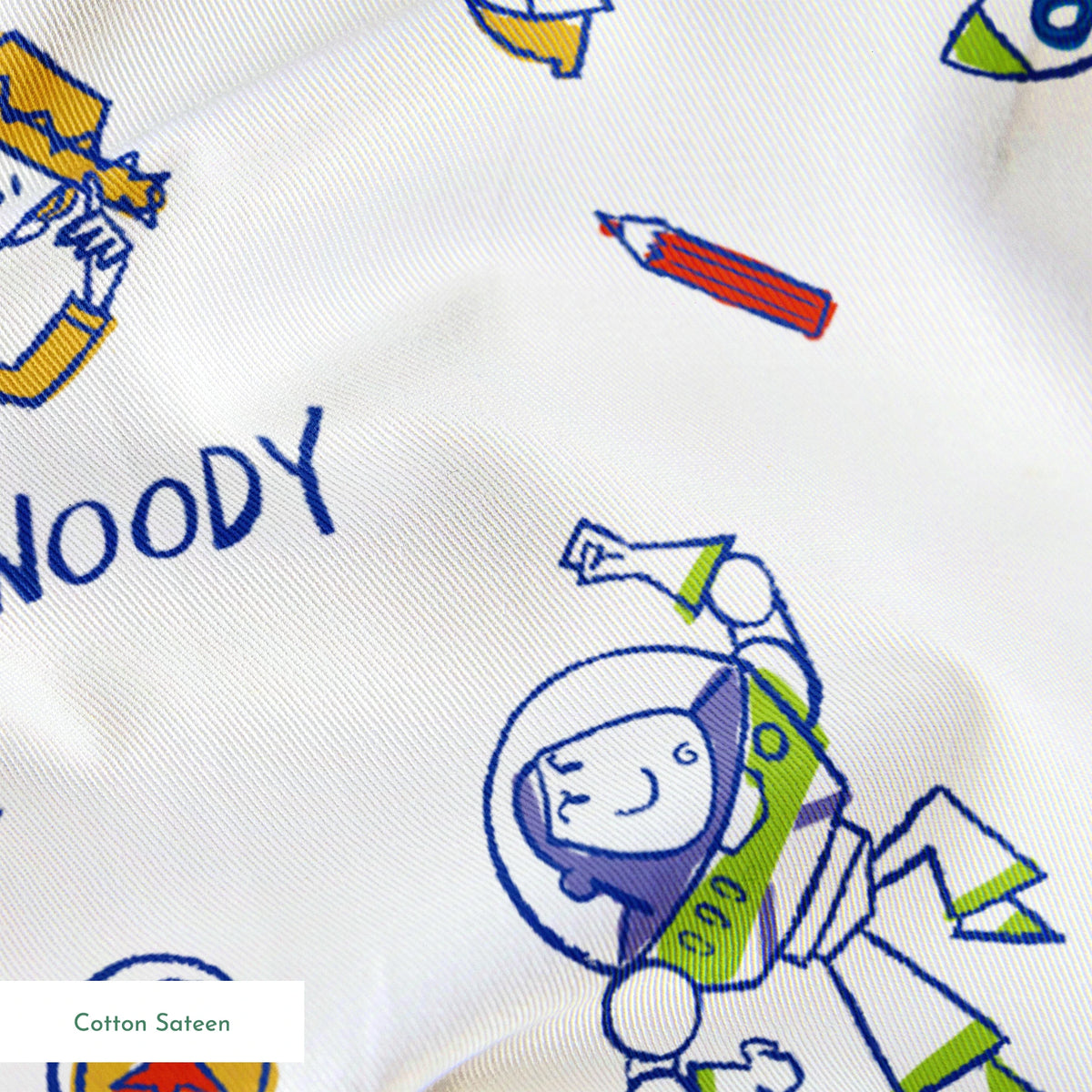 Toy Story pattern with Buzz Lightyear and Woody characters, stars, and spaceships on white background springs sateen texture