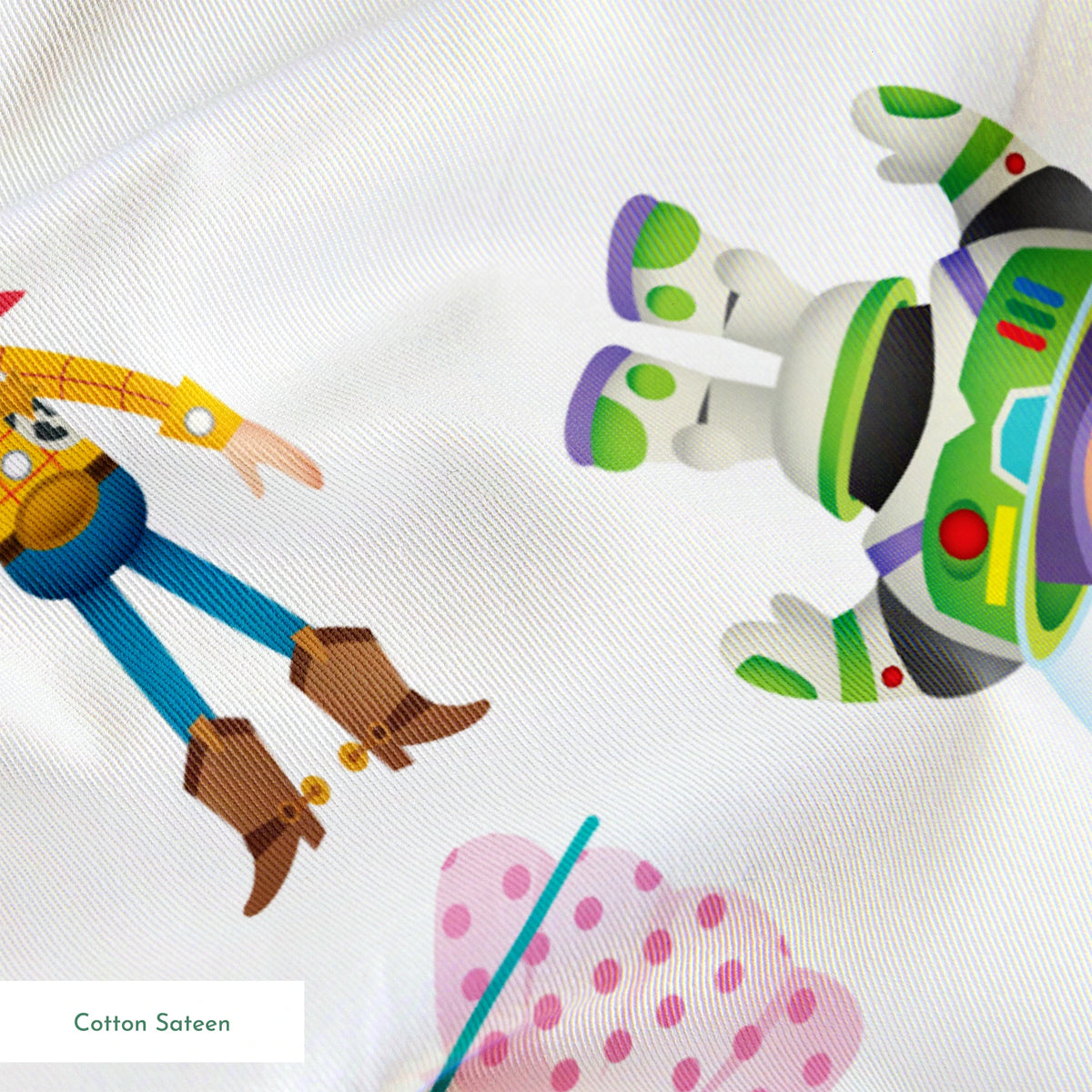 Toy Story character pattern with Woody, Buzz, Jessie, Rex, Slinky Dog and aliens on white background springs sateen texture