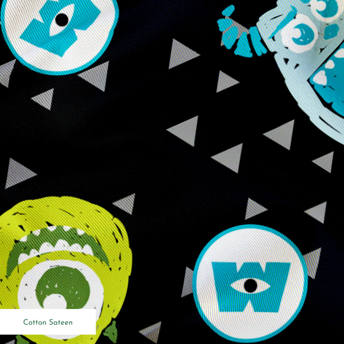 Monsters Inc pattern with Mike and Sulley on black background with gray triangles springs sateen texture