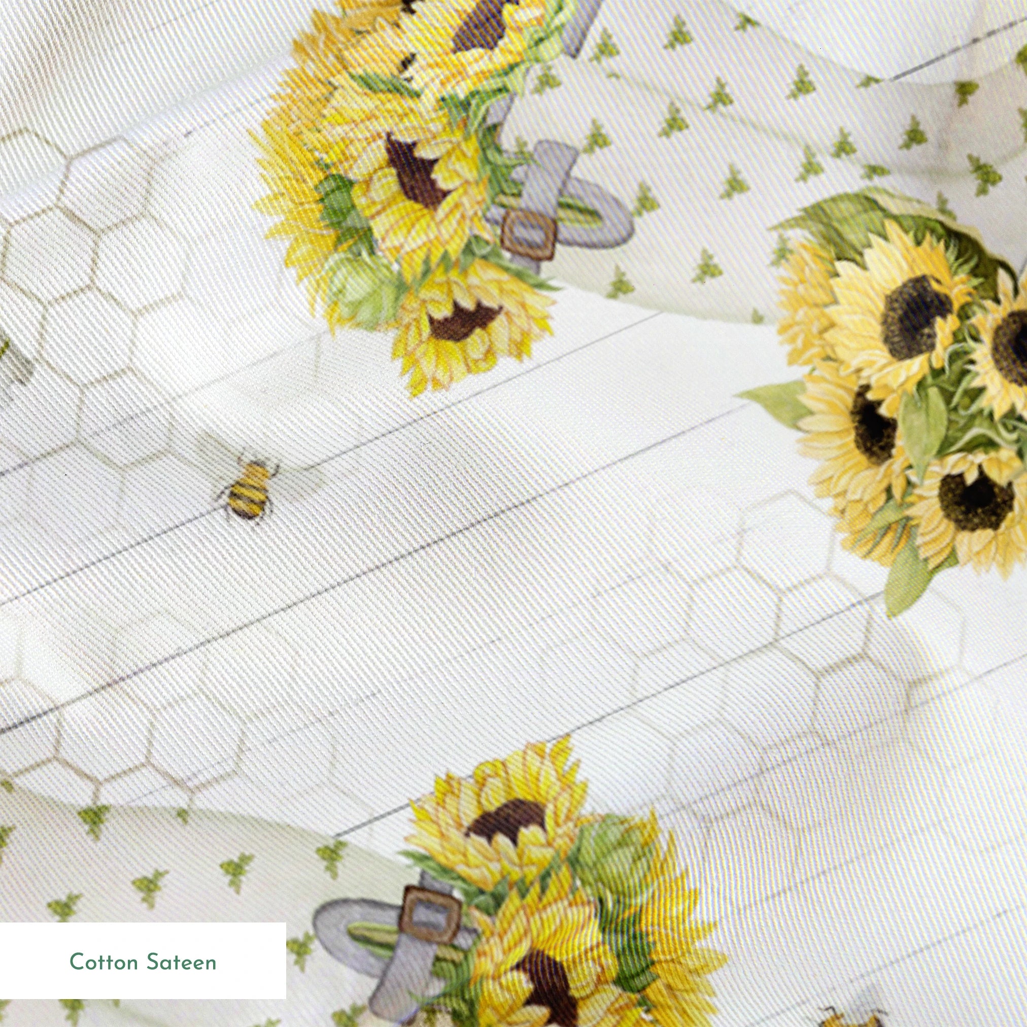 Sunflower-filled watering cans with bees, trowels, and garden tools on a white shiplap and honeycomb background. Designed by Nicole Tamarin. springs sateen texture