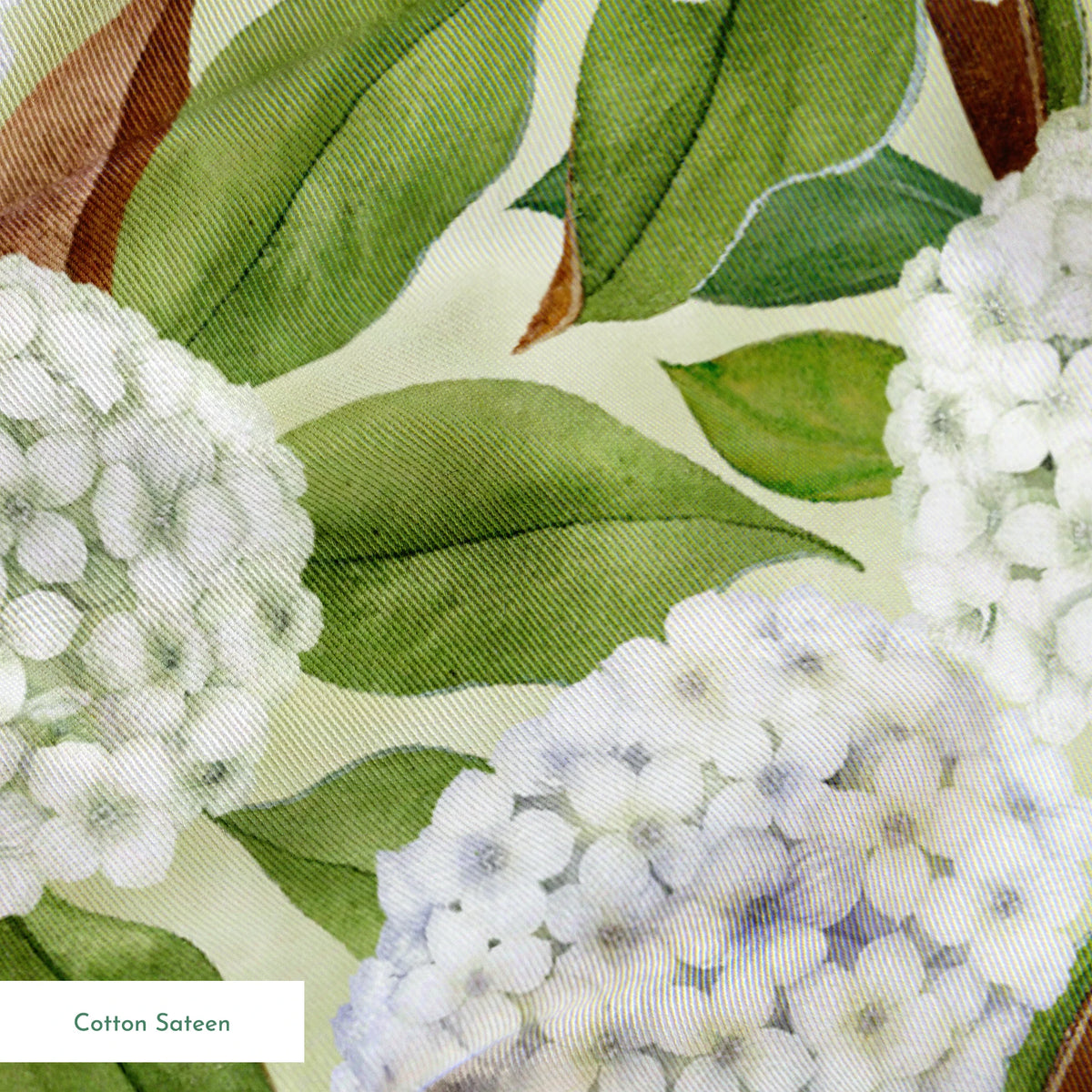 Realistic white hydrangea clusters with green leaves on a soft cream background, designed by Nicole Tamarin in a timeless botanical style. springs sateen texture