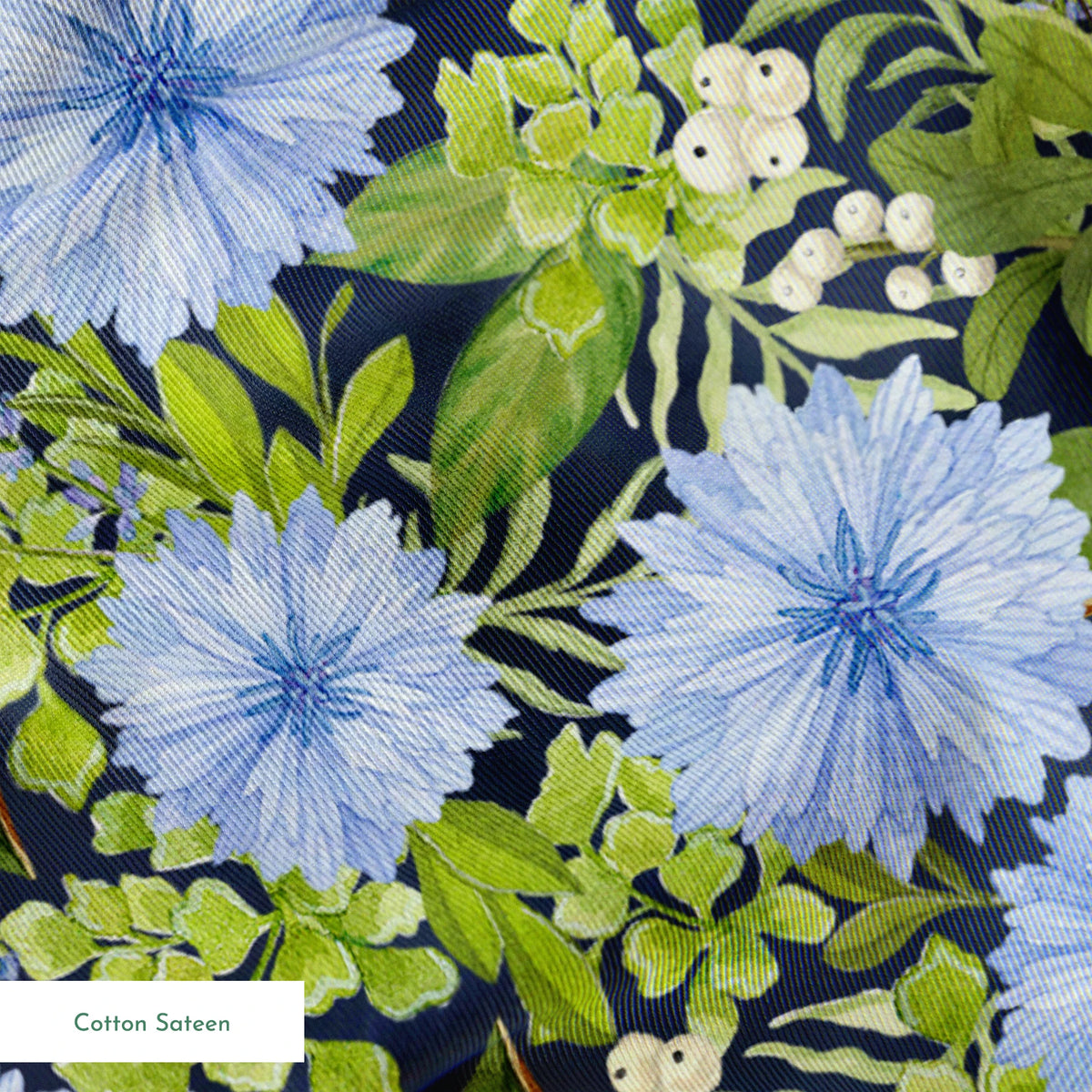 Beautiful floral pattern with light blue cornflowers and vibrant green leaves and foliage springs sateen texture