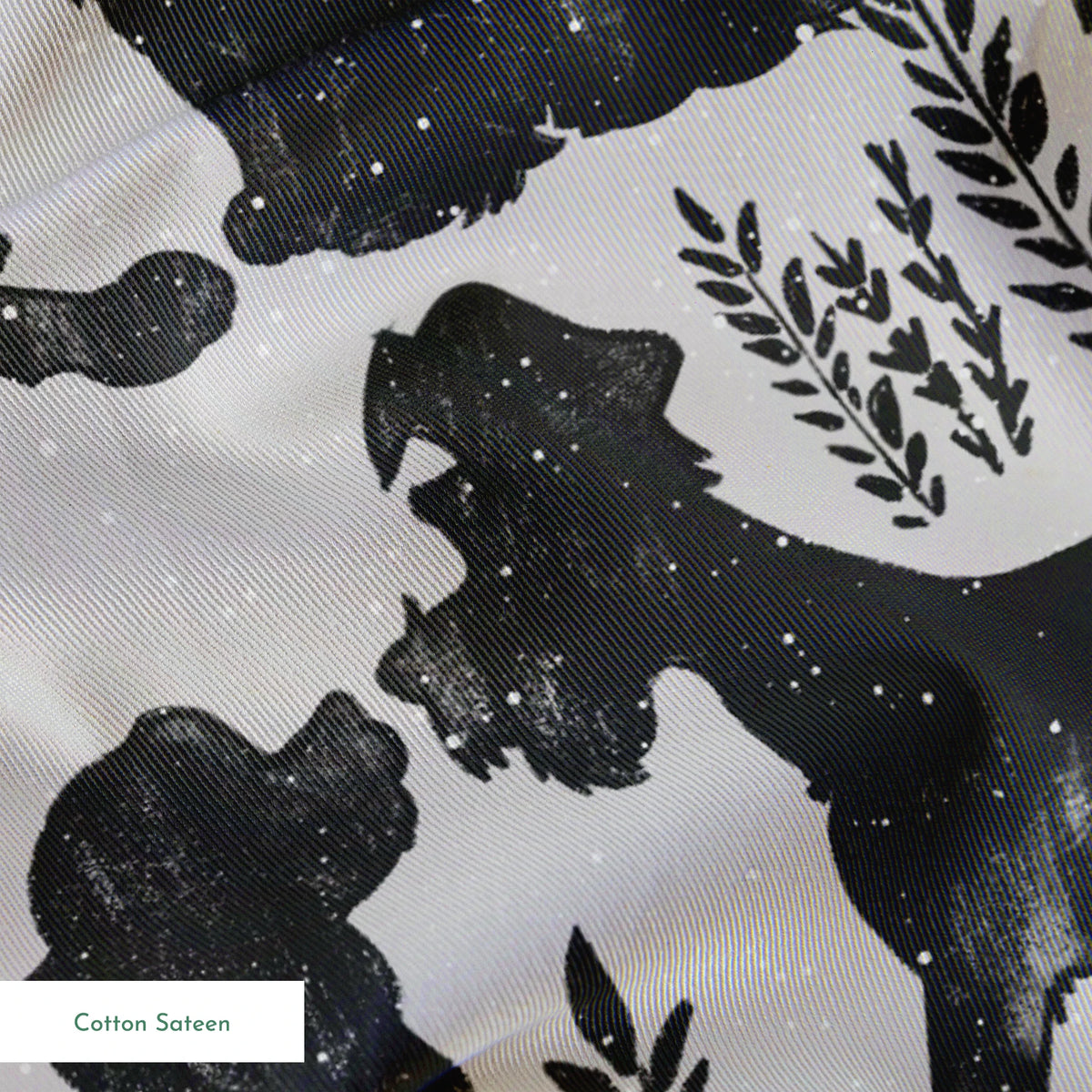 Repeating pattern of black dog silhouettes with decorative plant motifs on a light gray background springs sateen texture