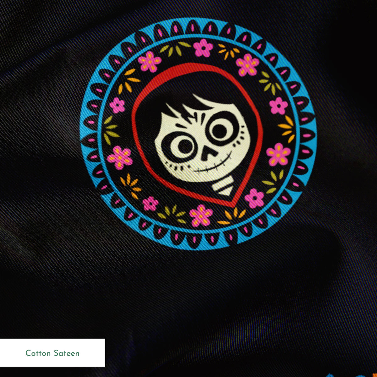 Colorful Coco sugar skull pattern with decorative circular borders on black background springs sateen texture