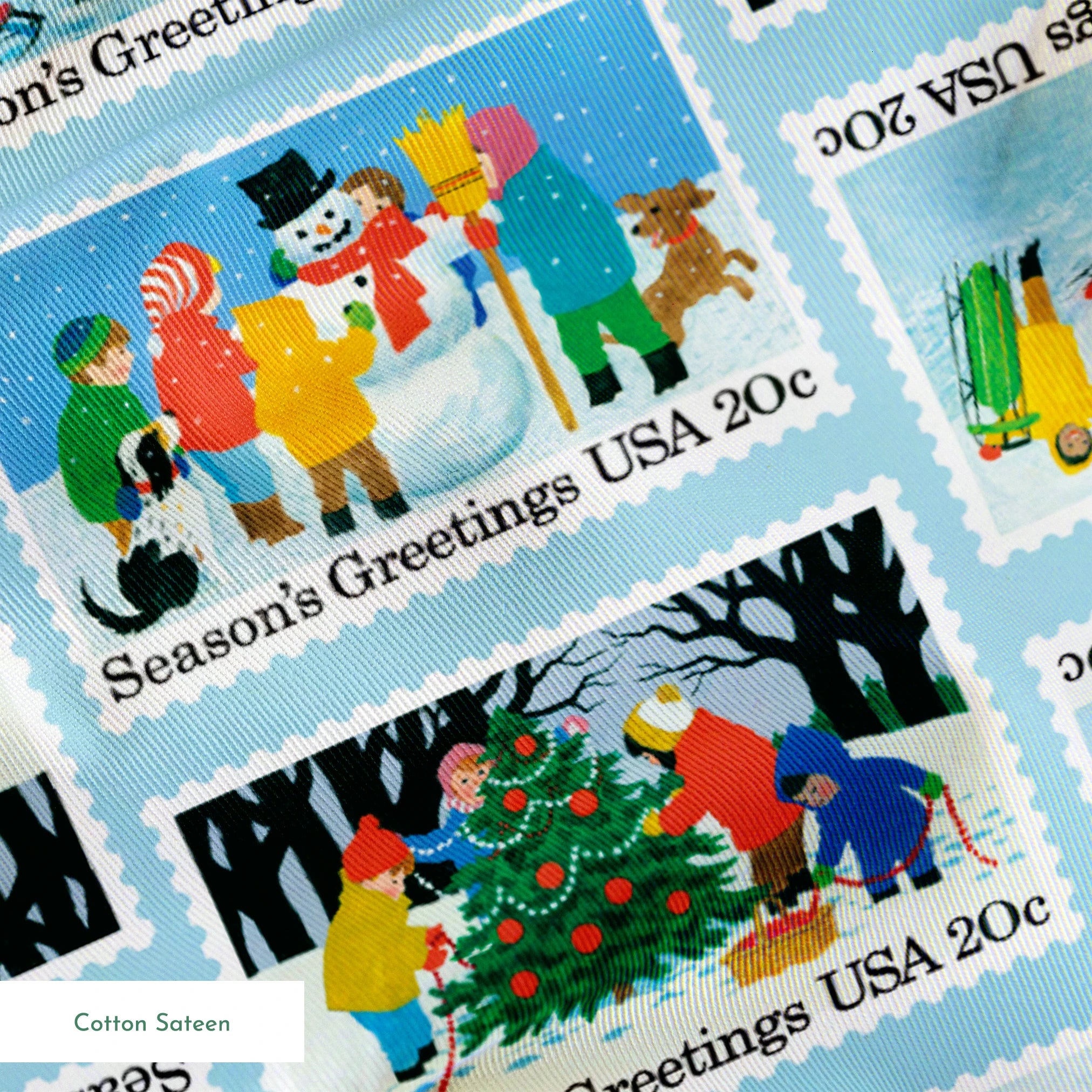 USPS Scenic Season's Greetings Stamps on Blue Fabric