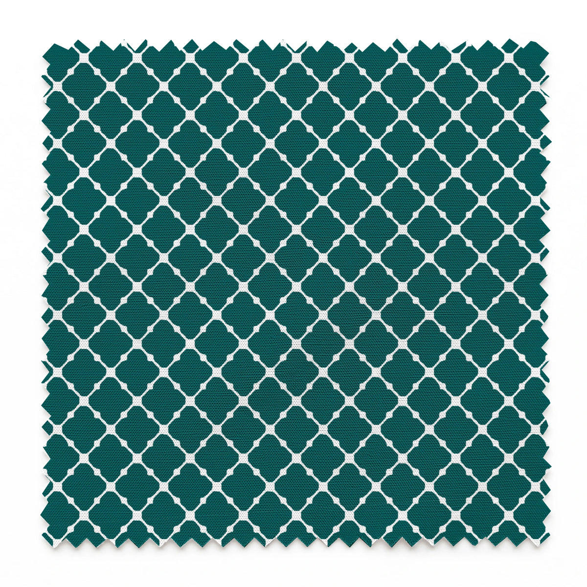 Dark teal quatrefoil pattern with white lattice outlines on a geometric background springs swatch pinked
