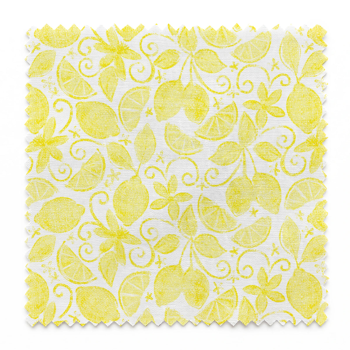 Yellow lemon pattern by Nicole Tamarin with sliced lemons, leaves, and swirls on a white background springs swatch pinked