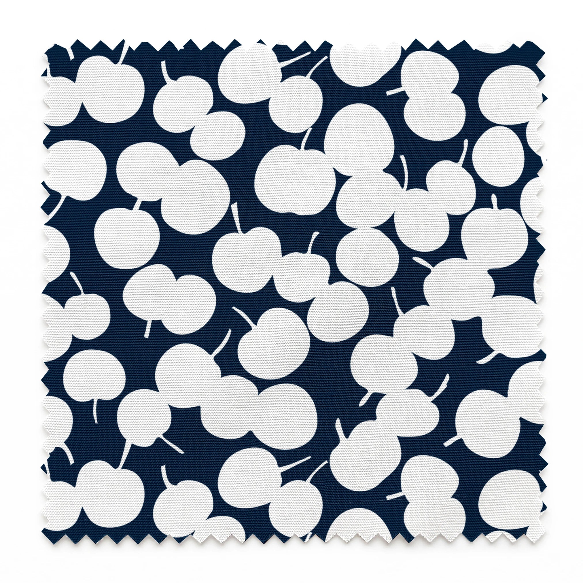 White cherry silhouettes scattered across a deep navy blue background in a playful pattern springs swatch pinked