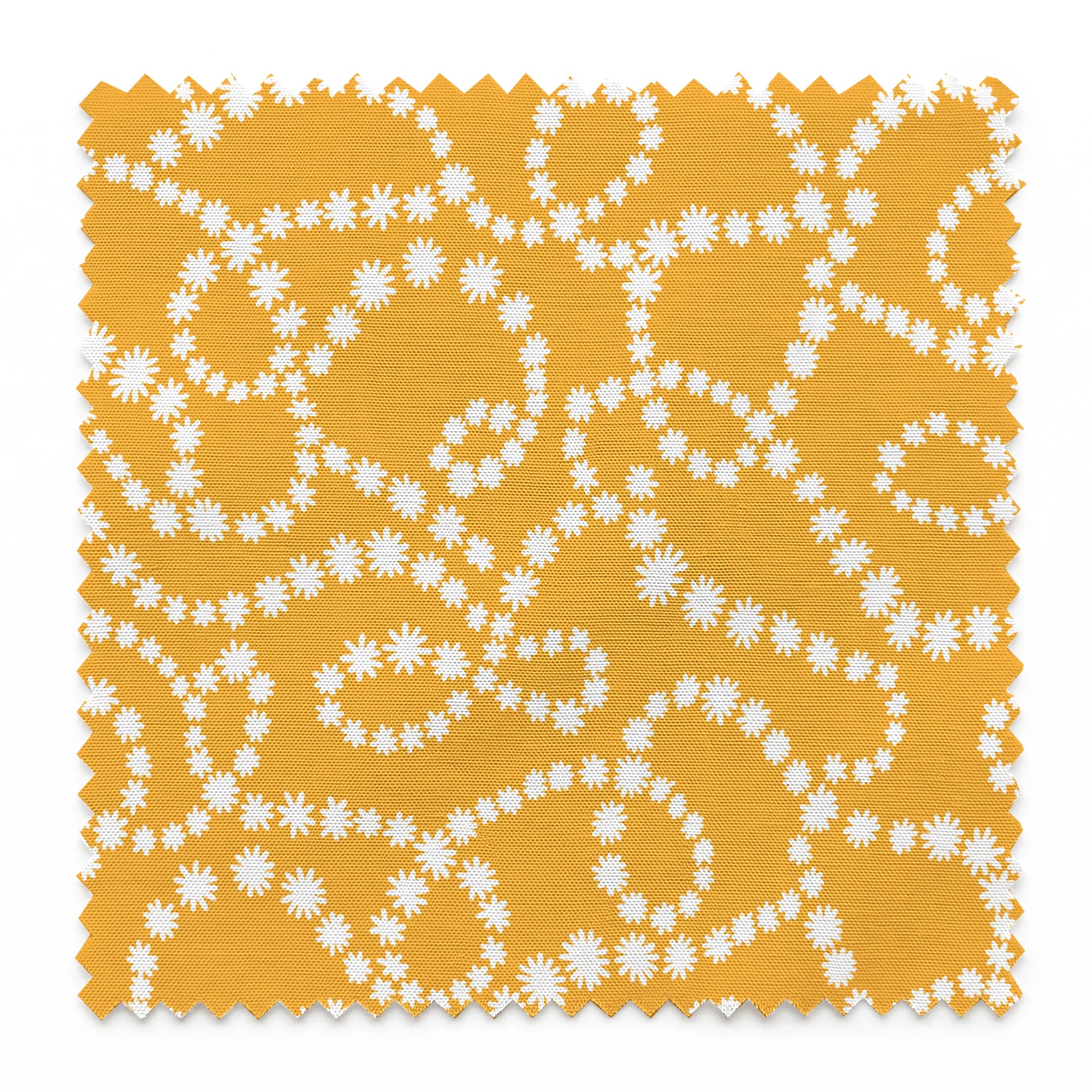 Mustard yellow background with swirling dotted white patterns forming organic circular designs springs swatch pinked