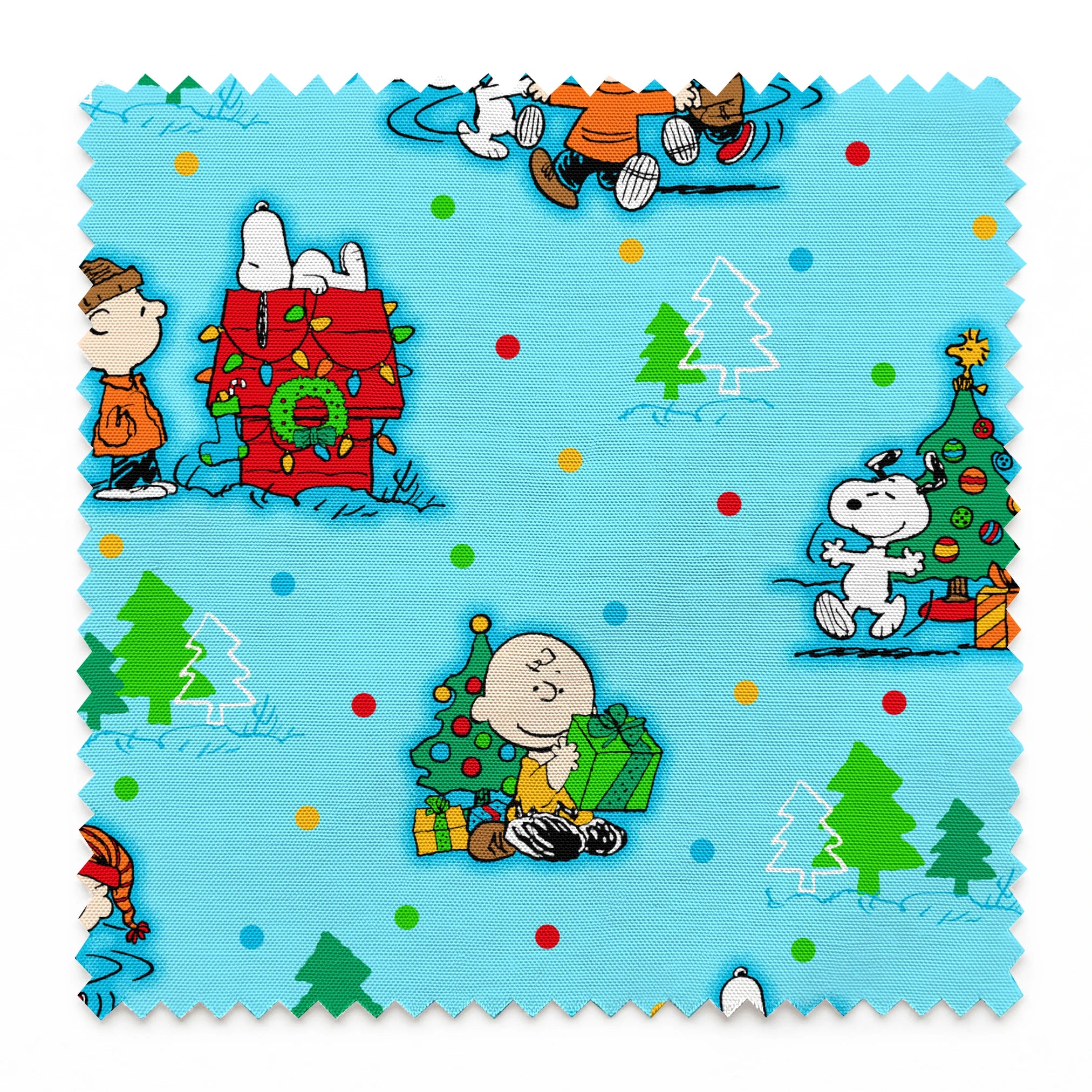 Peanuts Christmas pattern with Snoopy, Charlie Brown, and friends decorating trees on light blue background springs swatch pinked