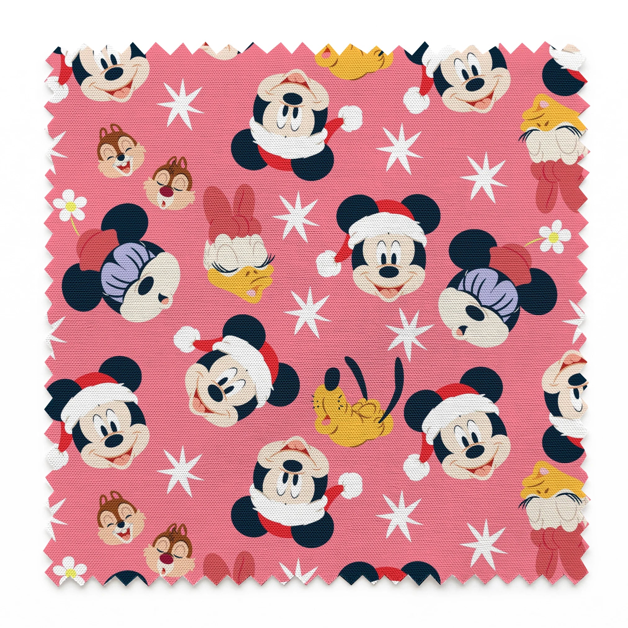 Mickey Mouse pattern with holiday elements on pink background, featuring white stars and gold accents springs swatch pinked