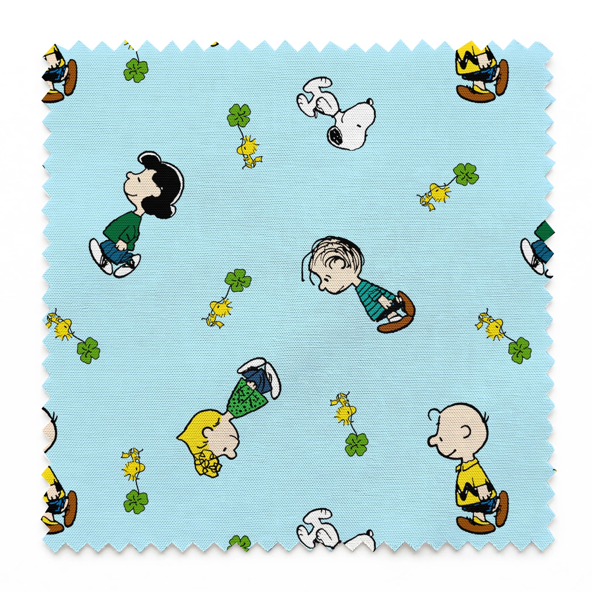 Peanuts cartoon characters on light blue background with clovers springs swatch pinked