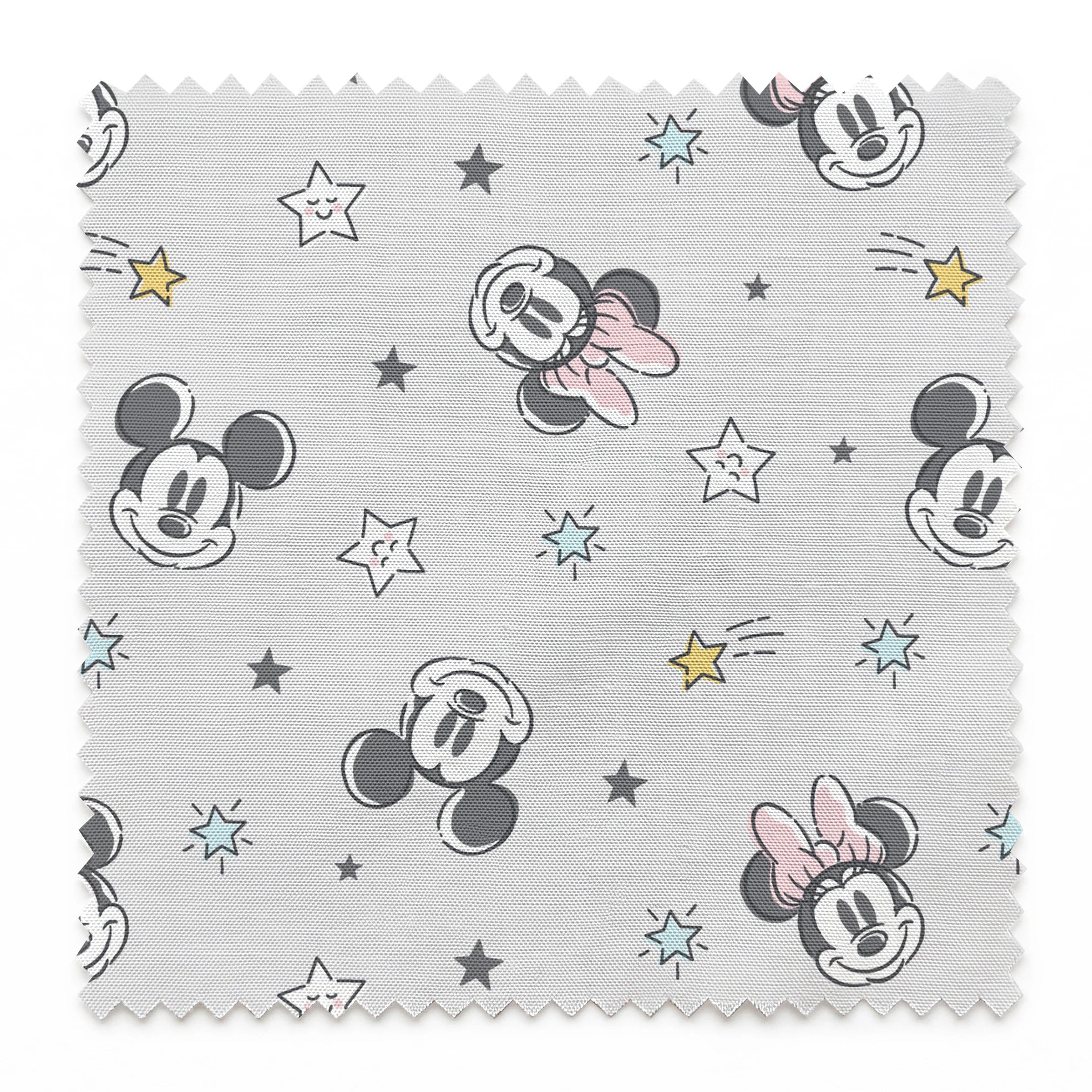 Mickey and Minnie Mouse pattern with stars on light gray background springs swatch pinked