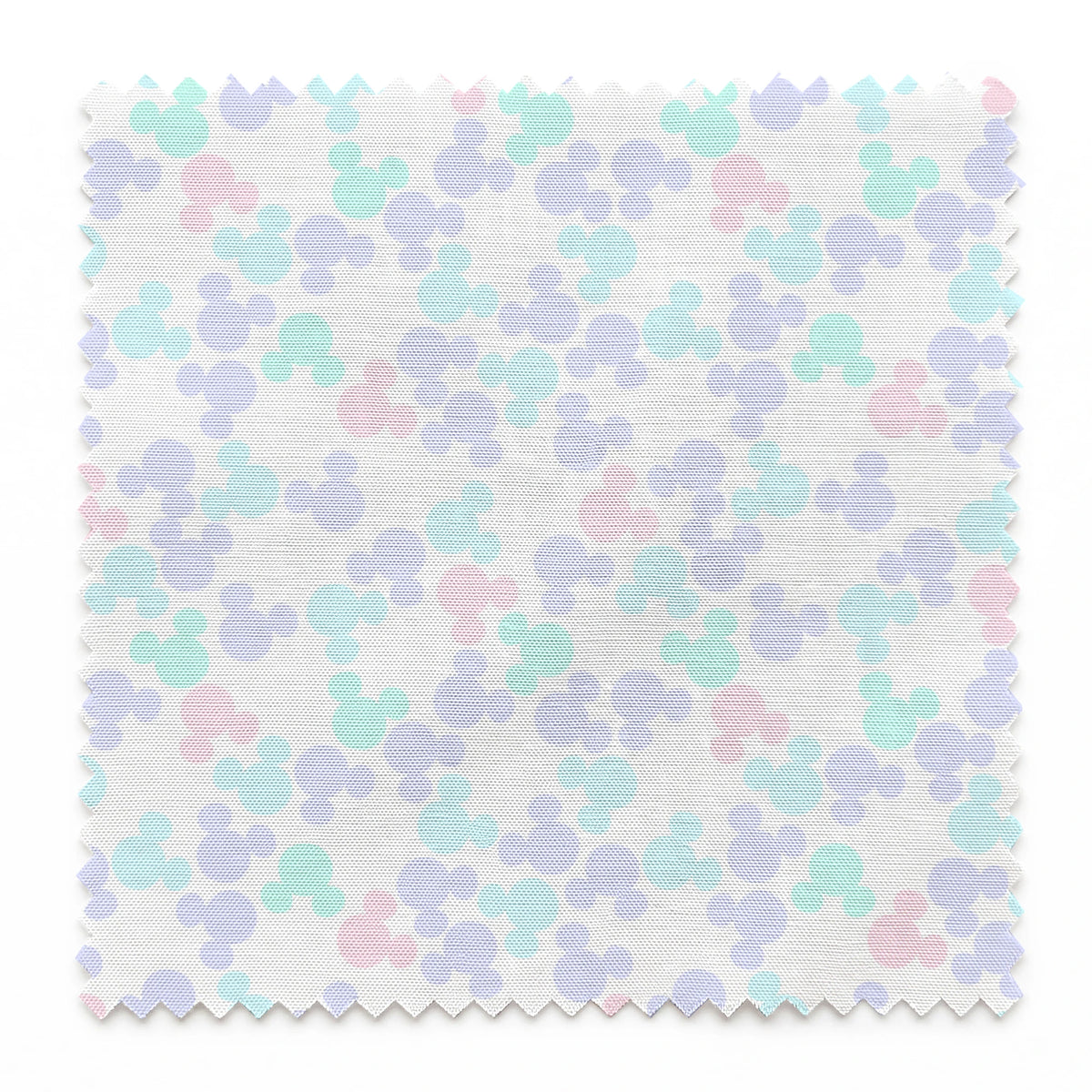 Pastel circular pattern with purple, light blue, green, and pink bubble shapes on white background springs swatch pinked