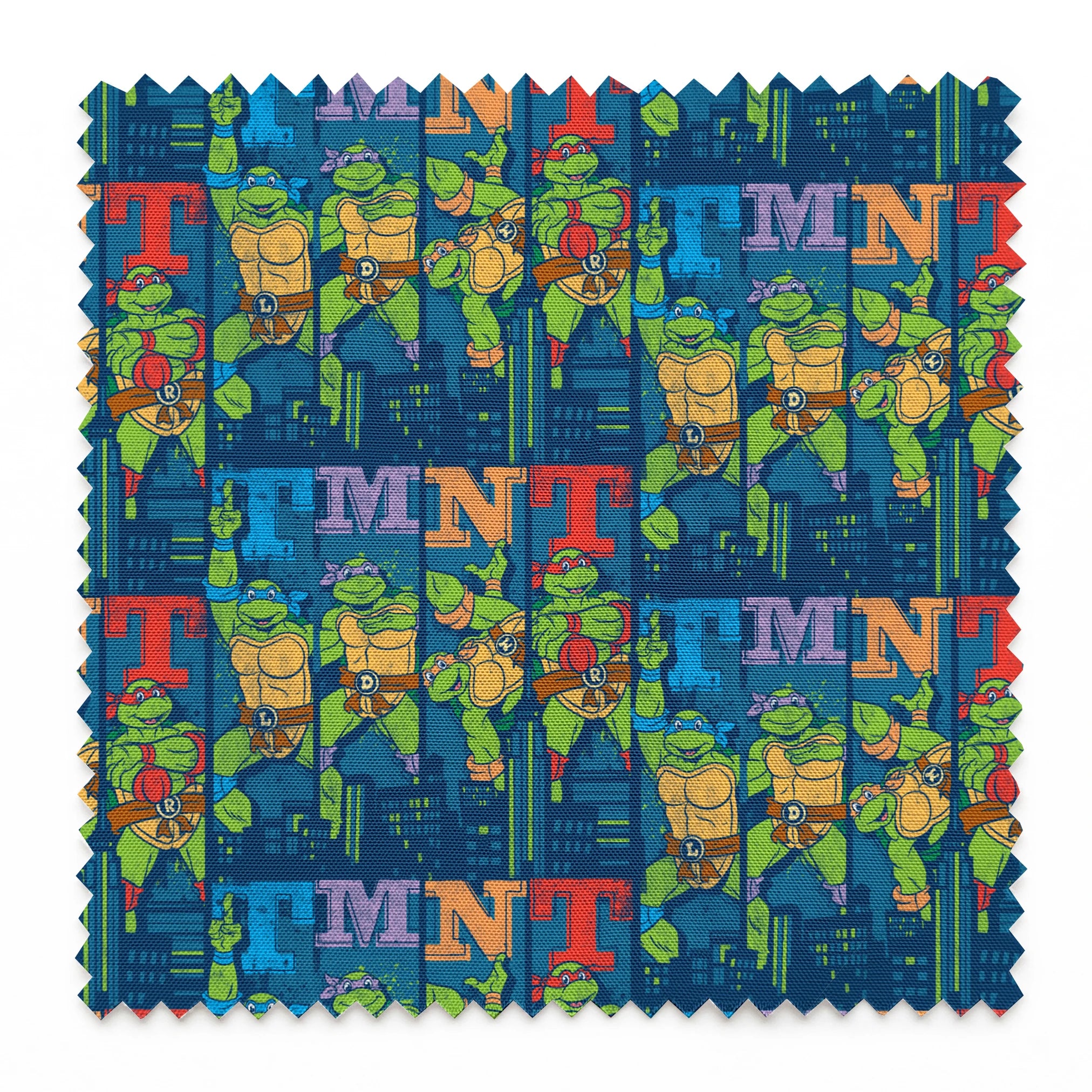 Colorful Teenage Mutant Ninja Turtles cartoon pattern with characters and "TMNT" text on blue cityscape background springs swatch pinked