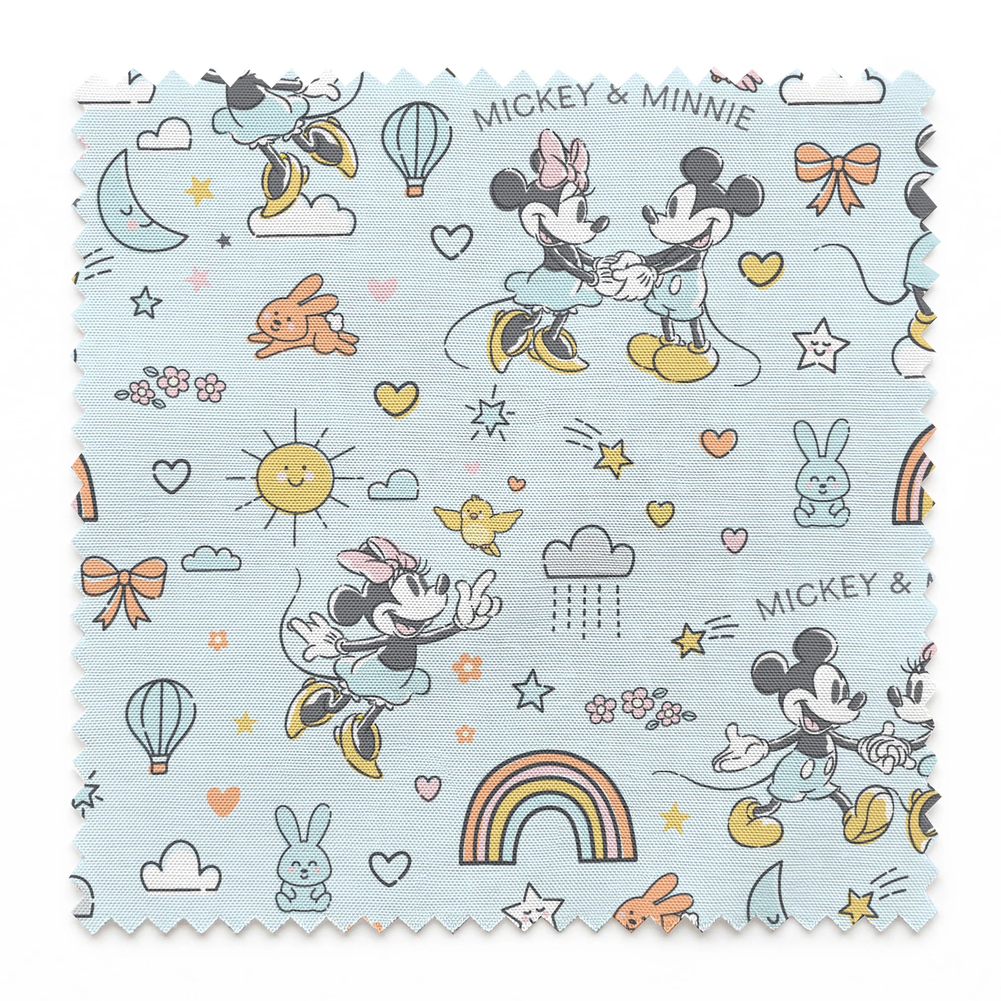 Playful Disney pattern with classic cartoon characters, rainbows, hearts, and whimsical elements on light blue background. springs swatch pinked