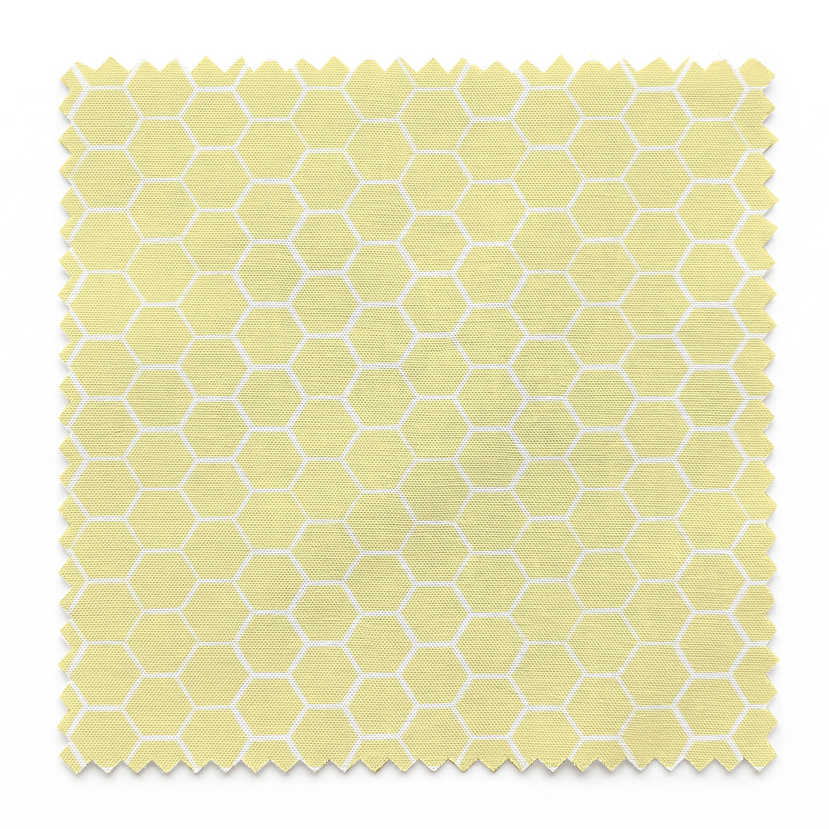 Yellow and white honeycomb pattern fabric designed by Nicole Tamarin with a soft geometric style perfect for bright, cheerful projects. springs swatch pinked