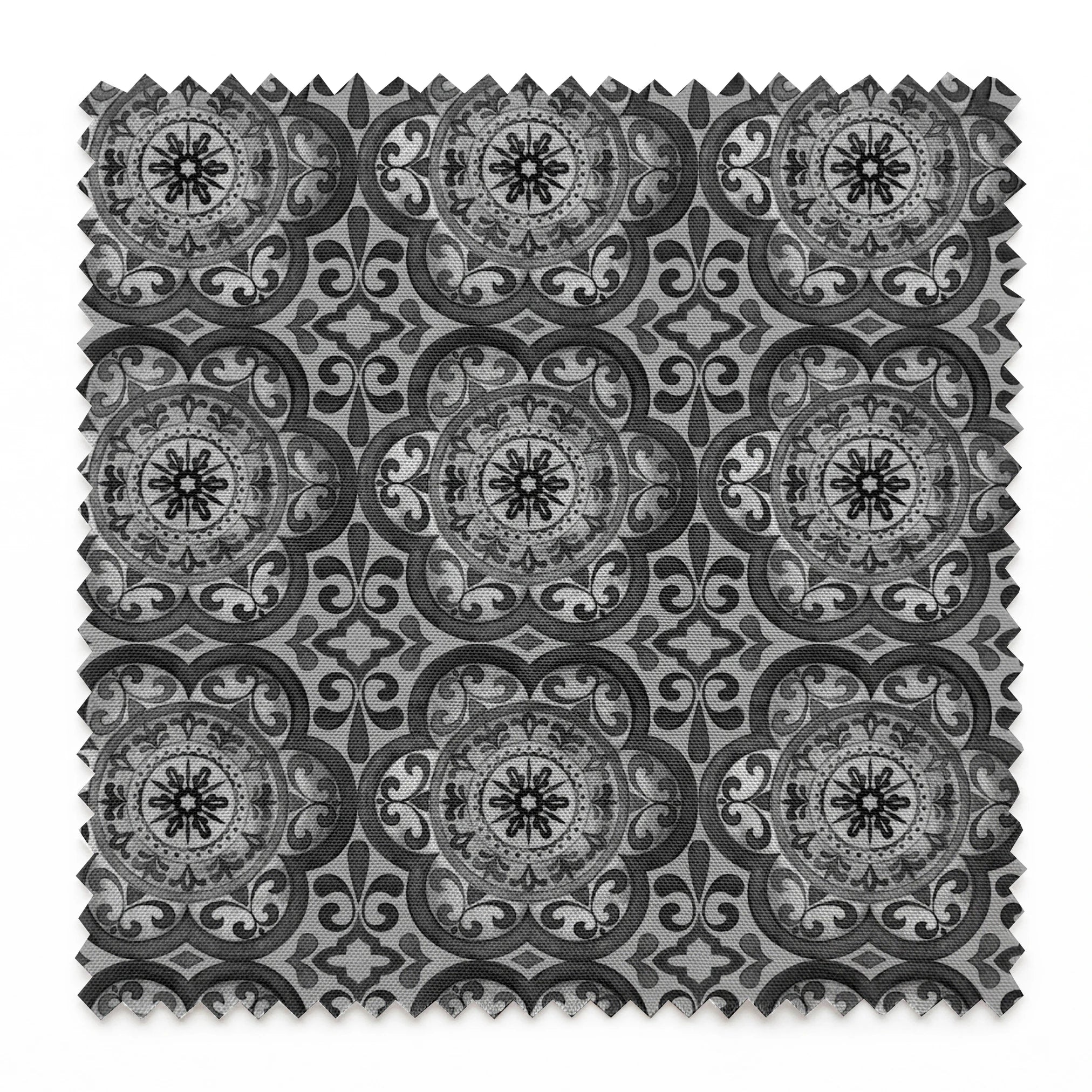 Grayscale medallion tile pattern with floral and scroll motifs in a symmetrical layout by Nicole Tamarin. springs swatch pinked