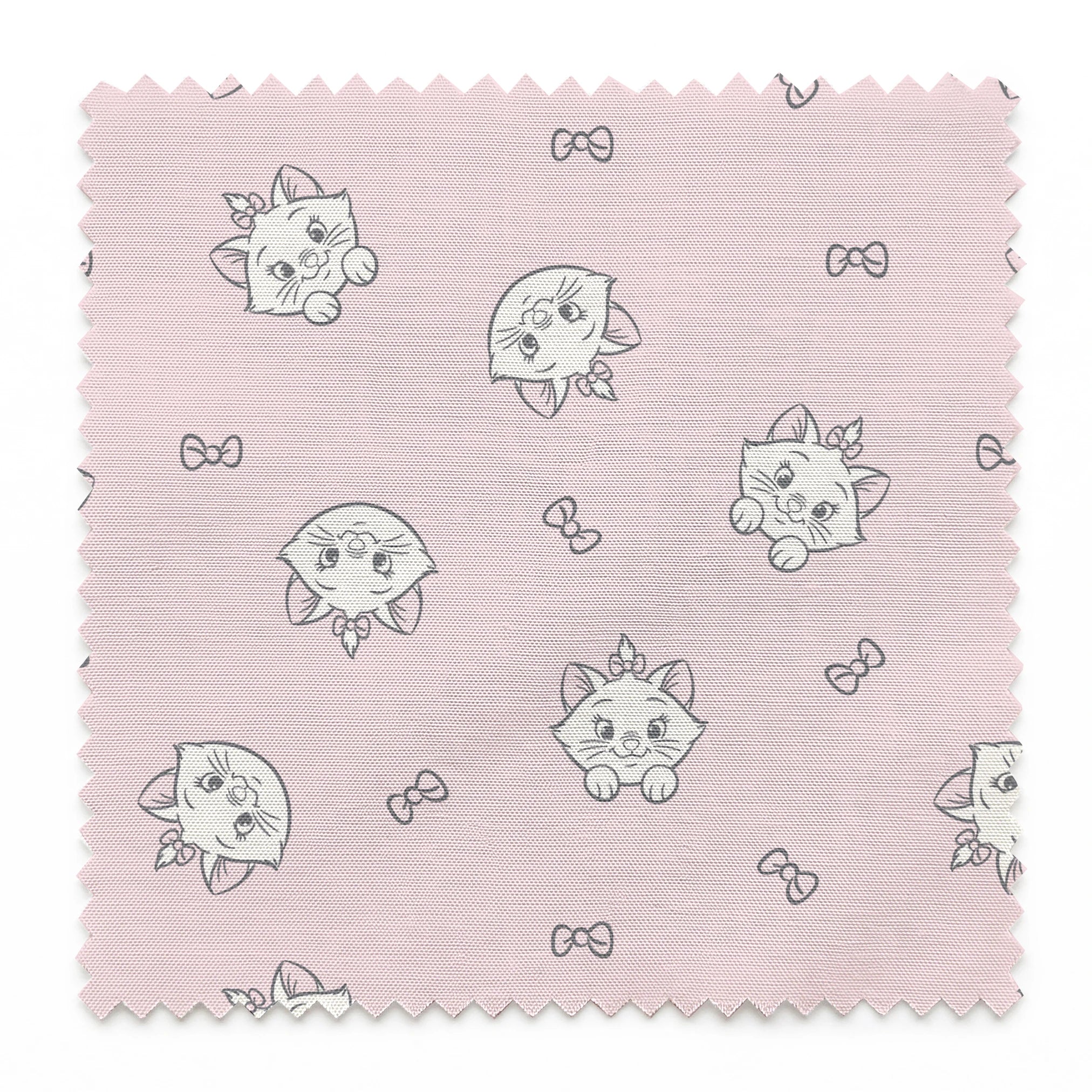 Cute cartoon cat faces with bows pattern on light pink background springs swatch pinked