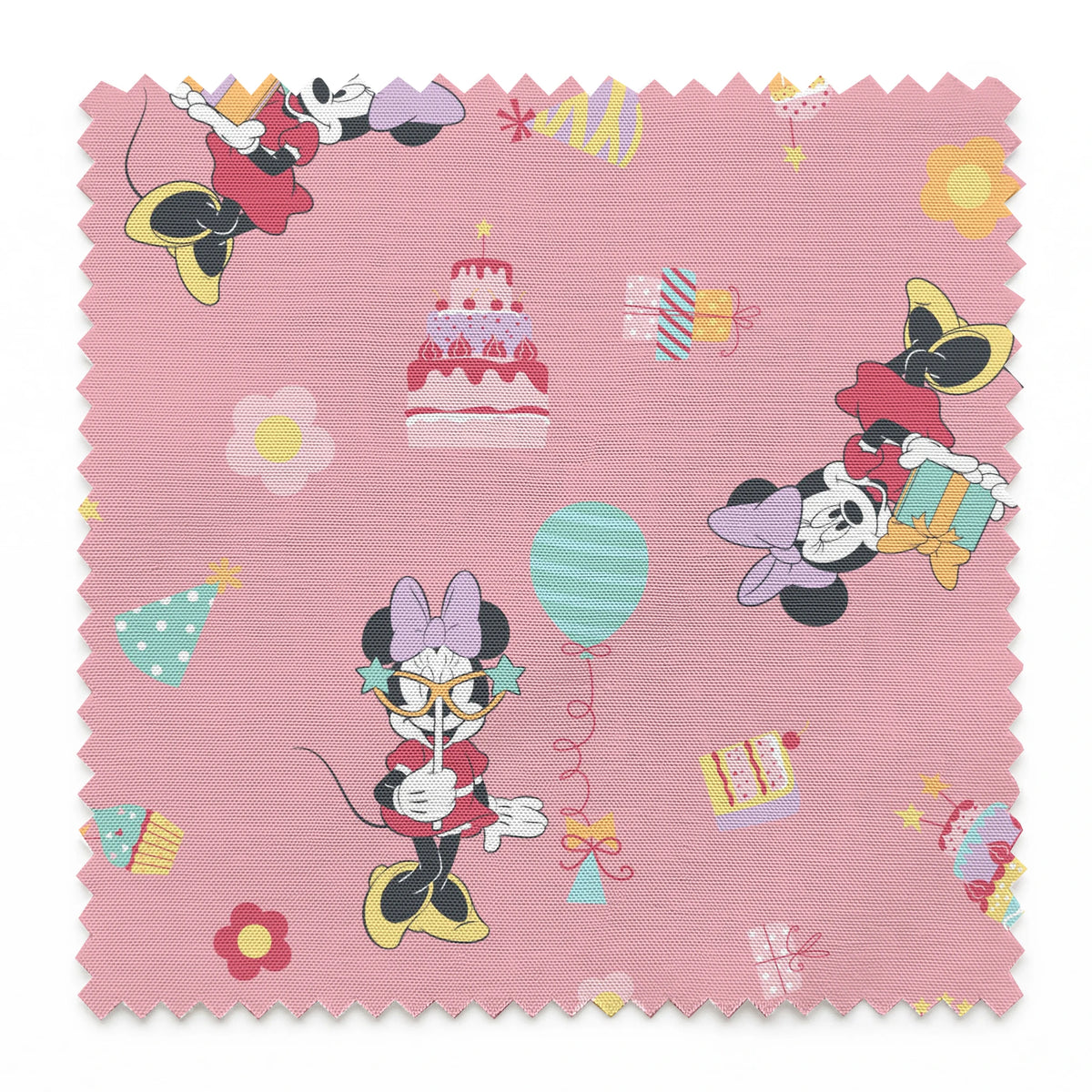 Minnie Mouse pattern on pink background with cakes, candy, and desserts scattered throughout.