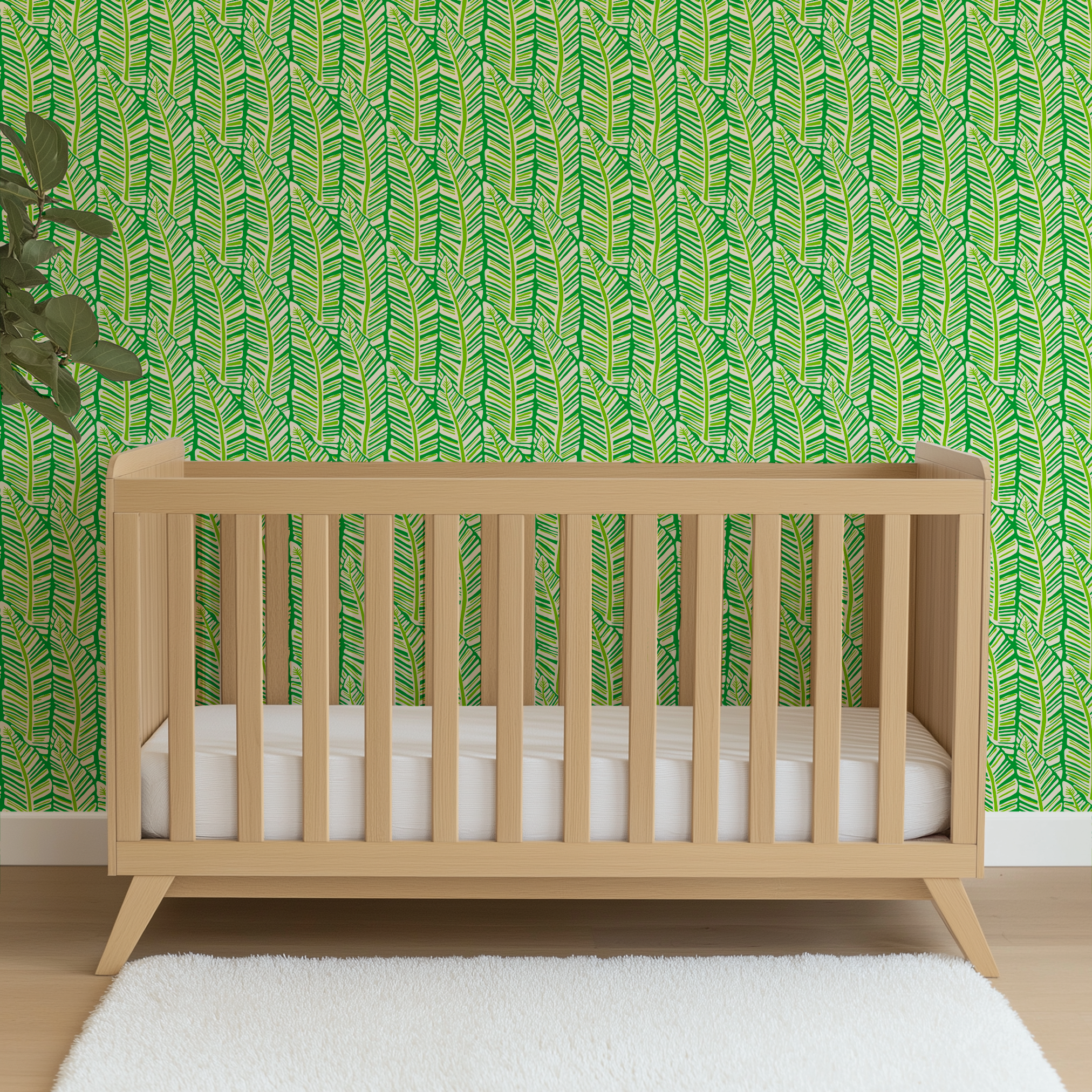 Tropical green palm frond pattern with overlapping leaves in various shades of green and yellow wallpaper crib mockup