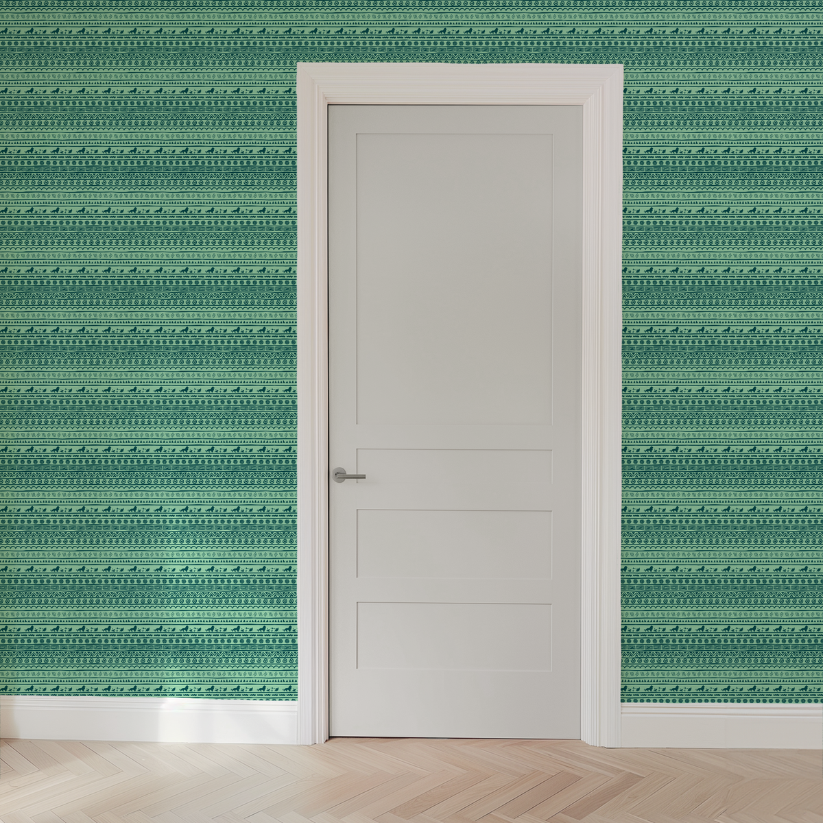 Traditional African-inspired pattern in dark teal on mint green with lions, spirals, triangles, and geometric motifs wallpaper door mockup